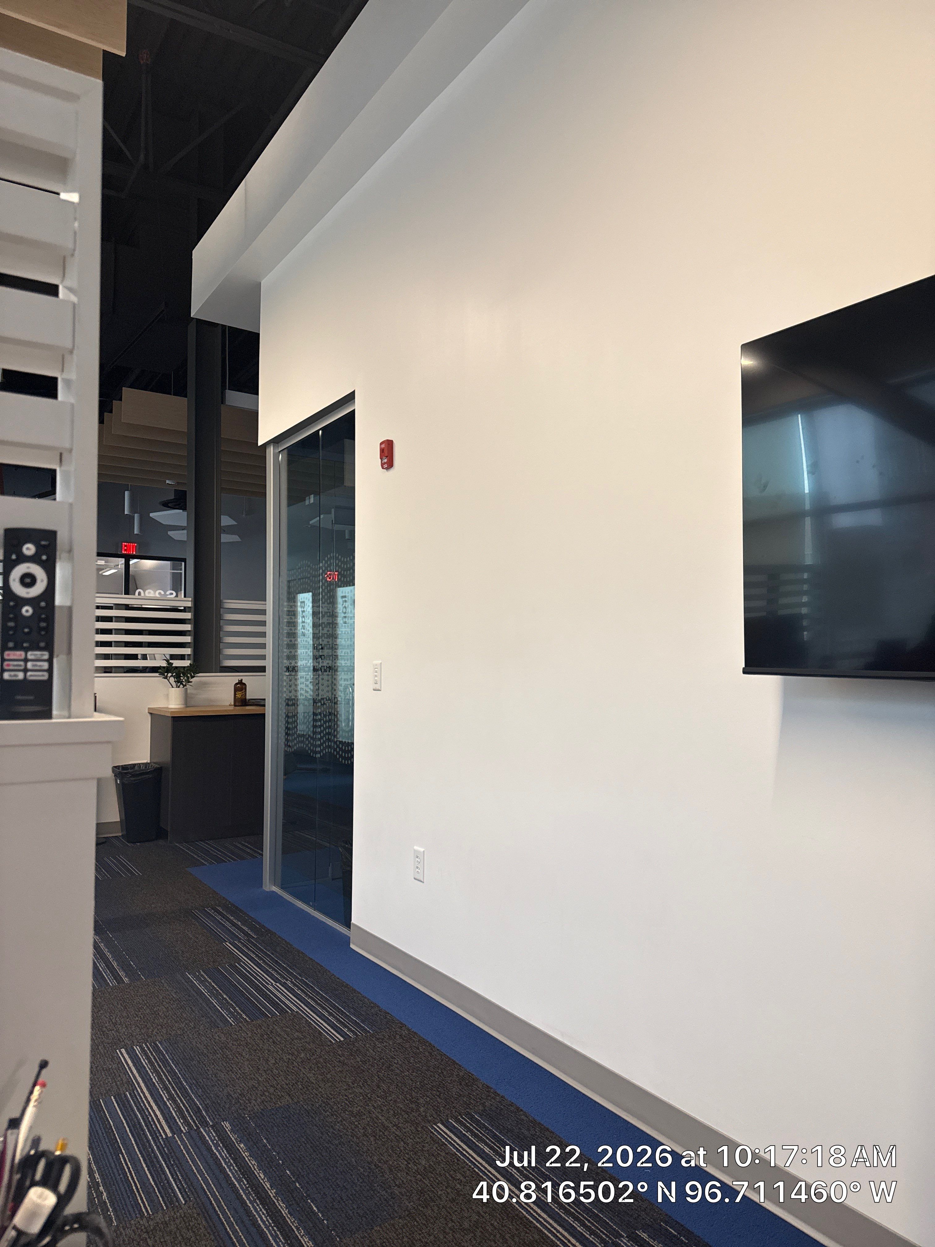 Modern Office Interior Renovation and Acoustic Baffle Installation by CompanyCam Sales Demo
