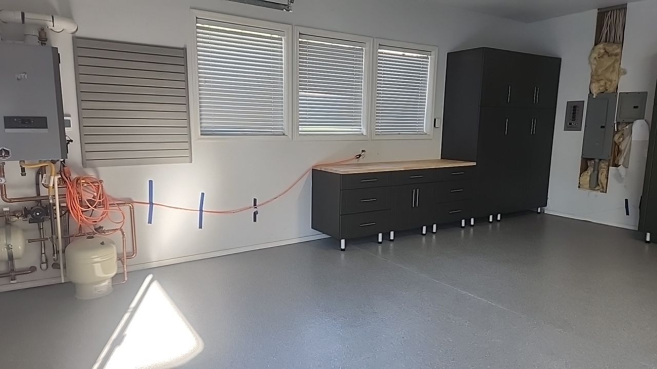 Garage Transformation using Canfield Hybrid & Grey Croc Cabinets by Croc Coatings, LLC