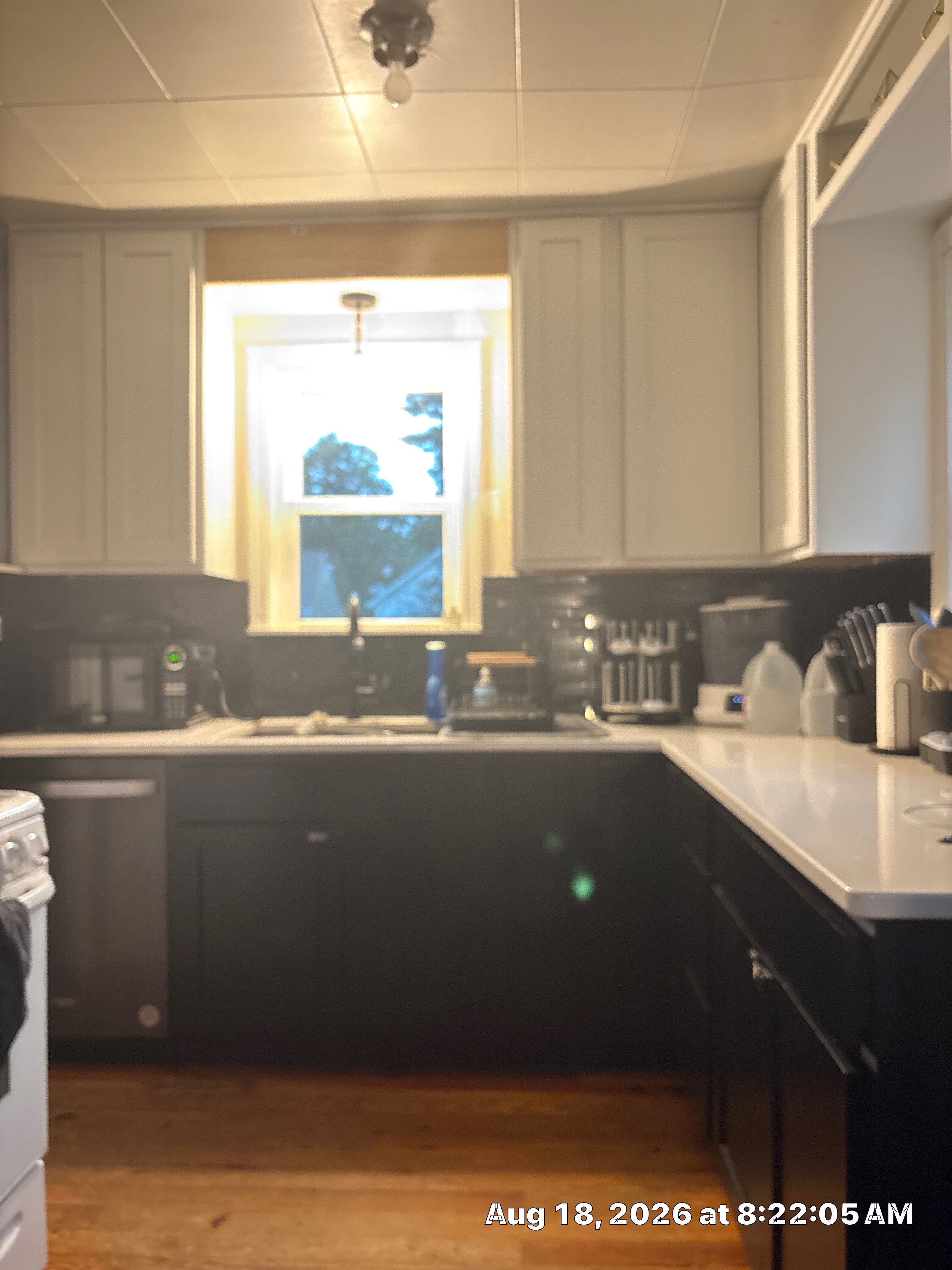 Lincoln Kitchen Renovation Featuring Black and White Shaker Cabinetry by CompanyCam Sales Demo