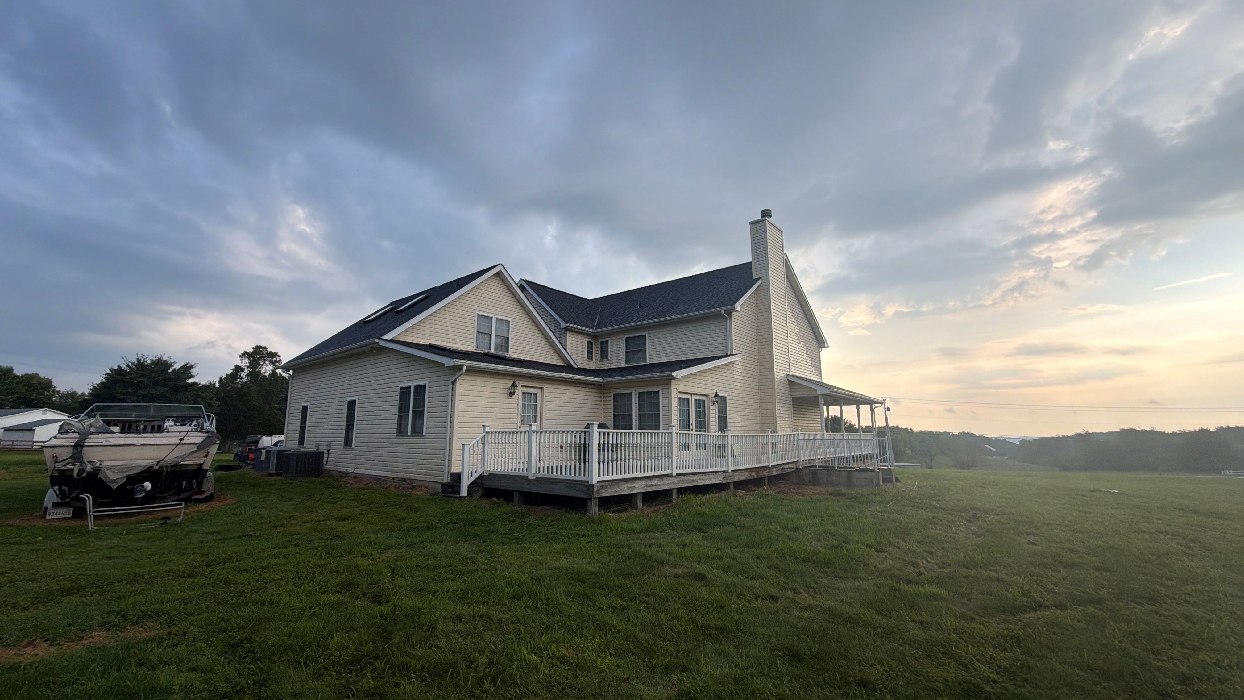 Vinyl Siding House Washing and Wood Deck Restoration in Carroll County by Baltimore Pressure Washers Inc.