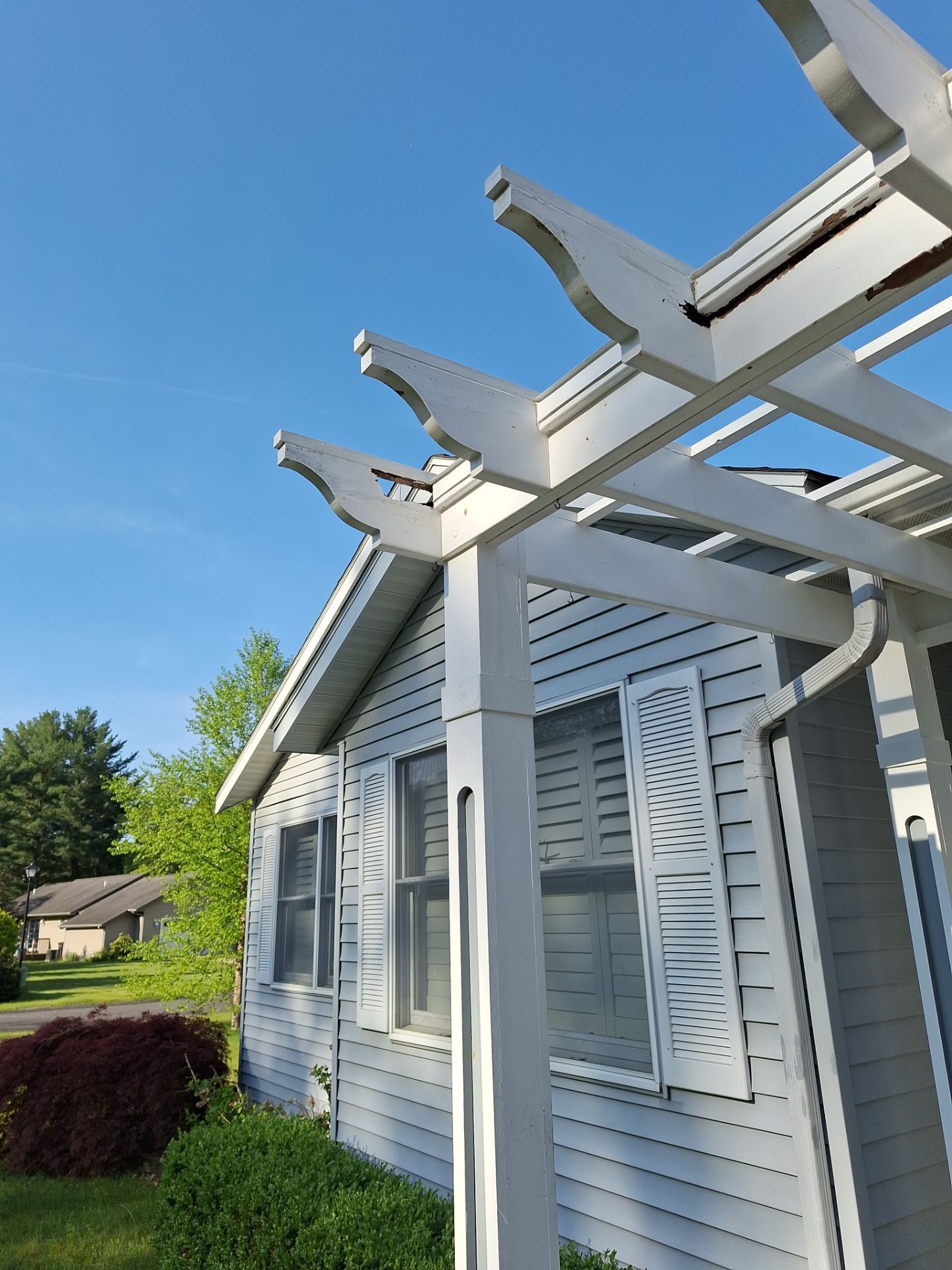 Repaint bedroom furniture, Pergola, and doors. Stain decking by Gordon Painting