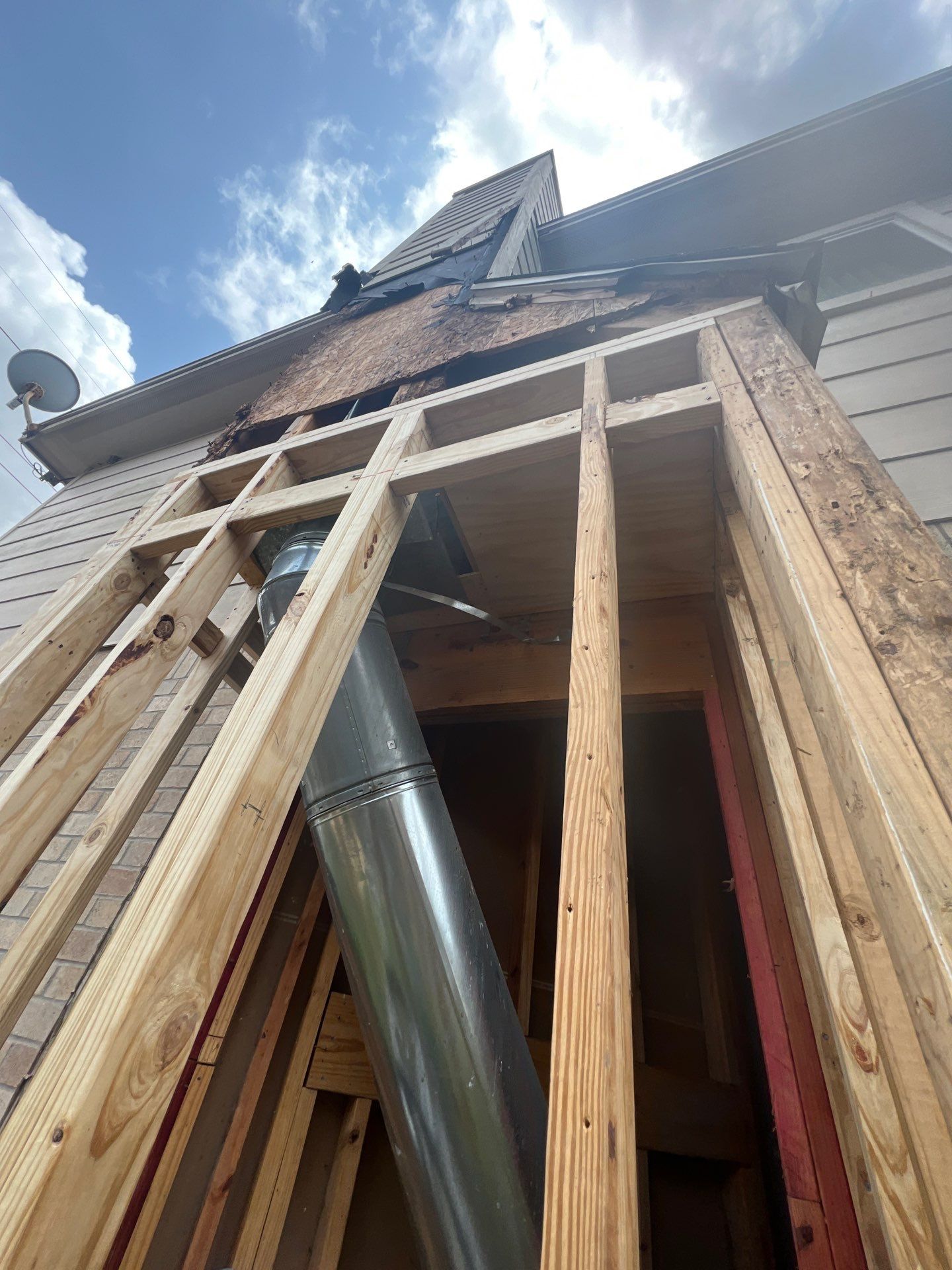 Chimney looks good but its BAD! by Bayfront Roofing and Construction