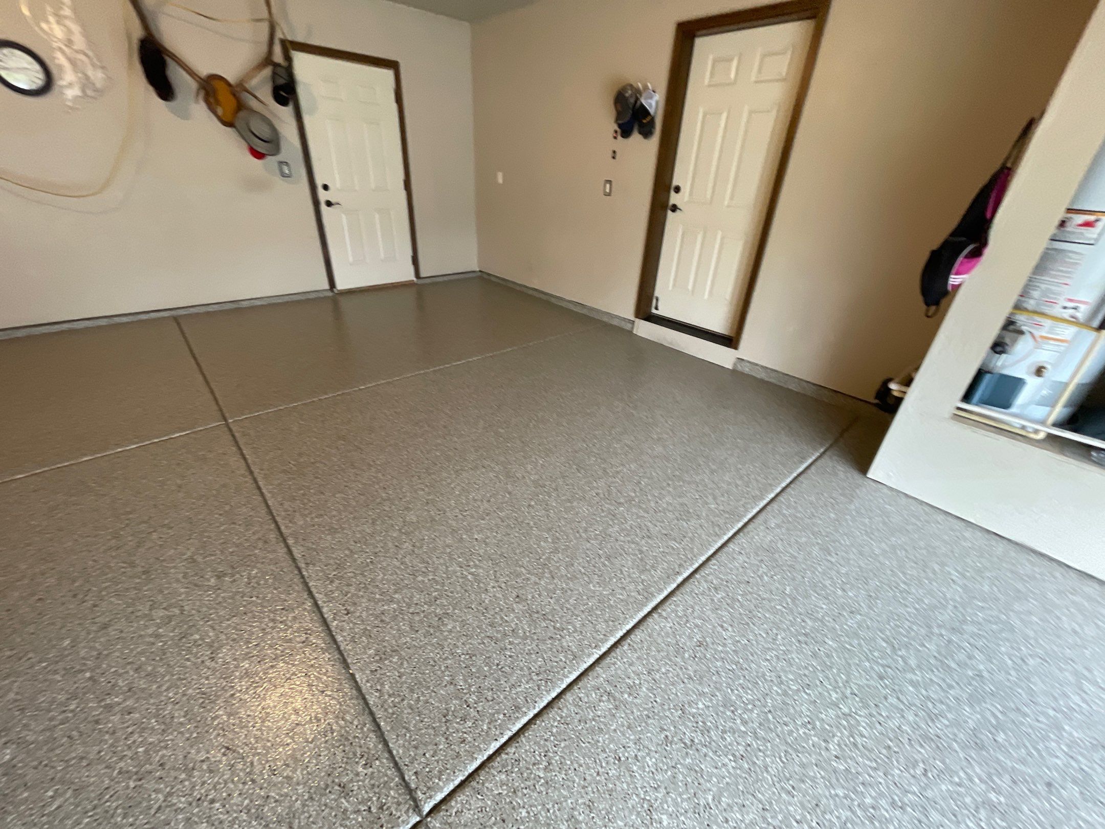 Garage Transformation using Pebble Beach and Front Porch using Greystone by Croc Coatings, LLC