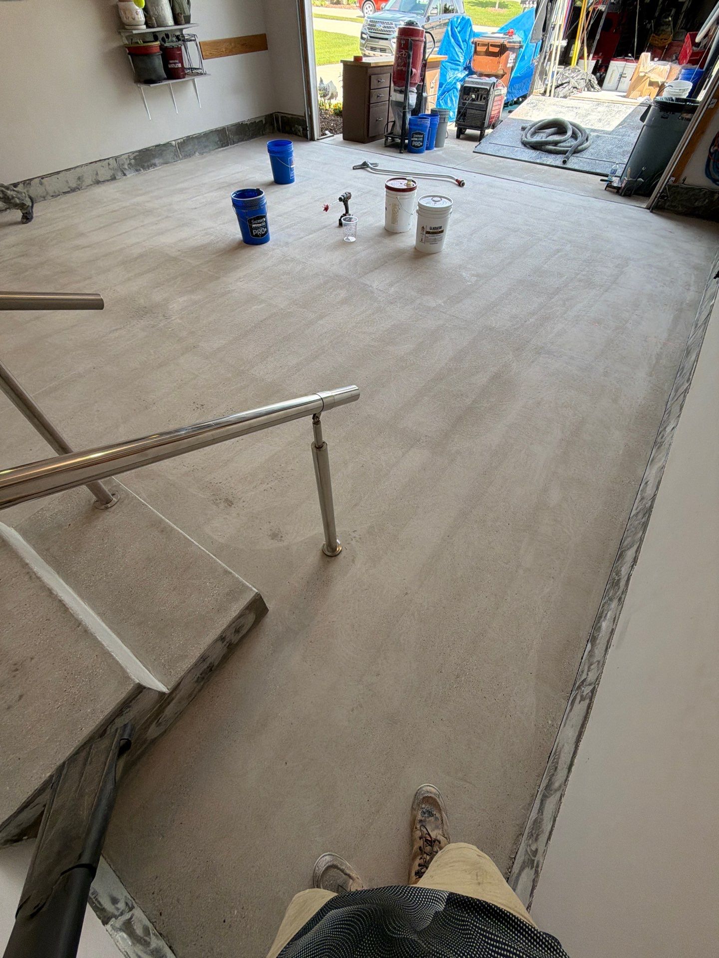 Garnet Polyaspartic Flake Garage Floor Installation in Zeeland by Gordon Painting