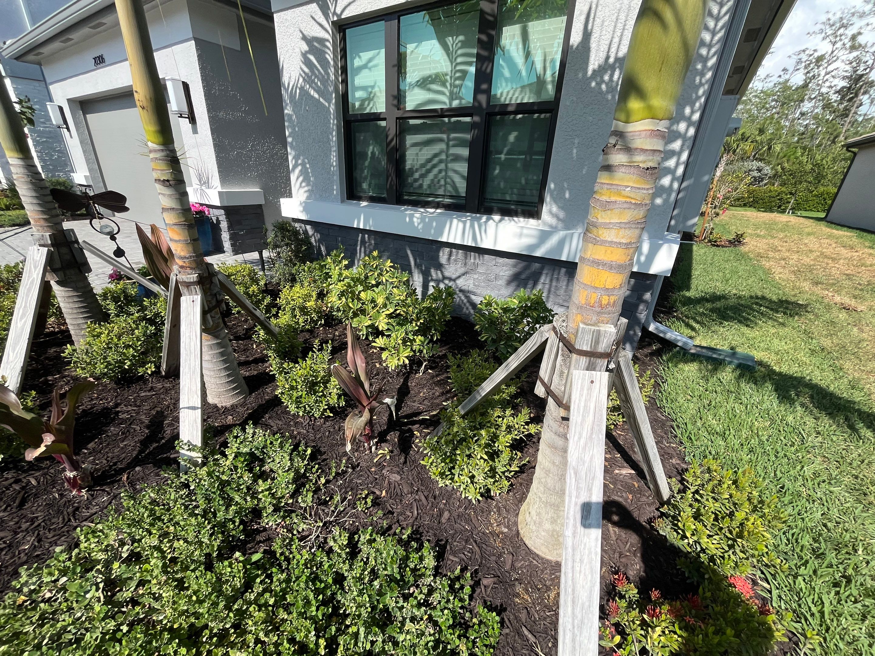 Grey Seamless Gutter Installation in Estero FL by Gutter Professors