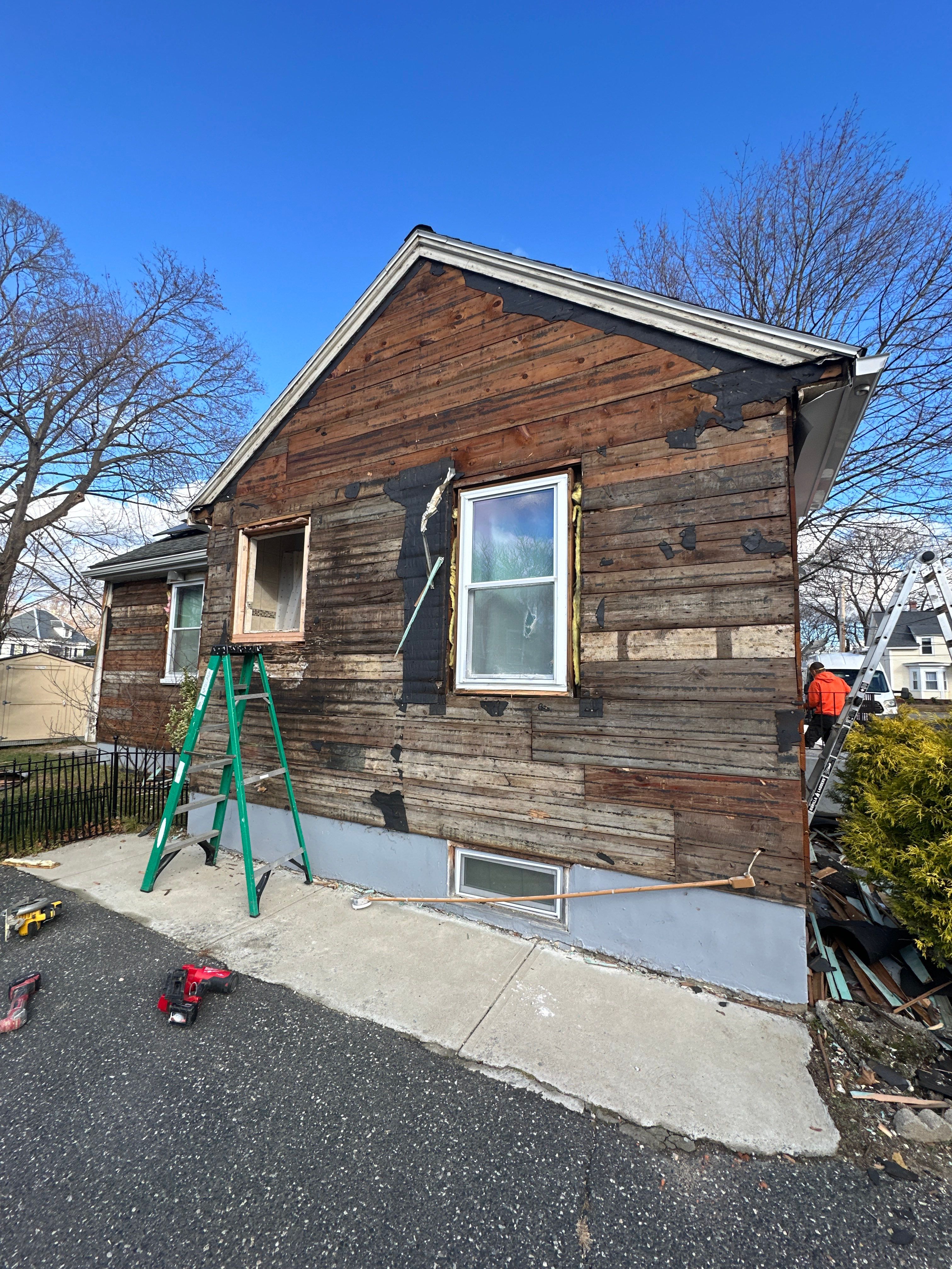 Complete Exterior Restoration - Multi-Layer Siding Removal & Window Replacement by UBrothers Construction