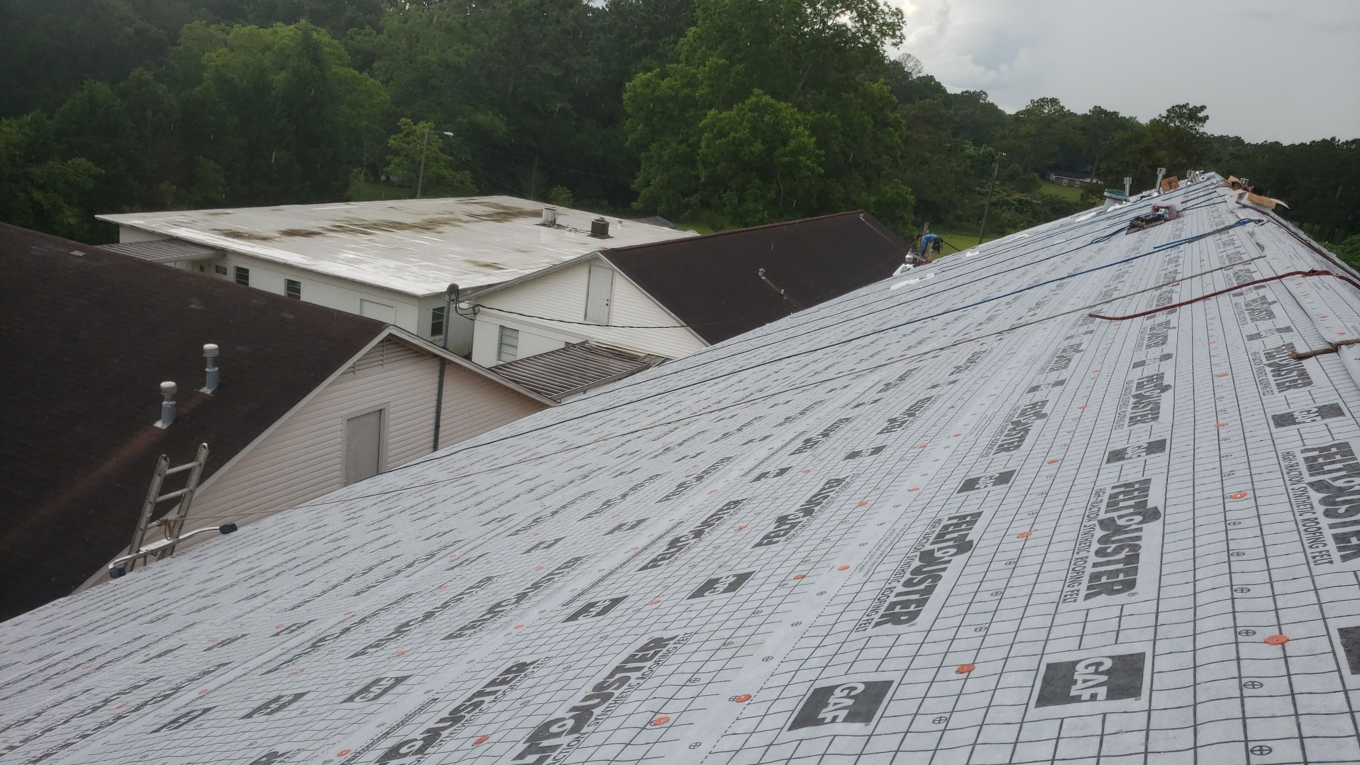 Residential Roofing Installation using Roof Replacement by American Roofing & Construction LLC