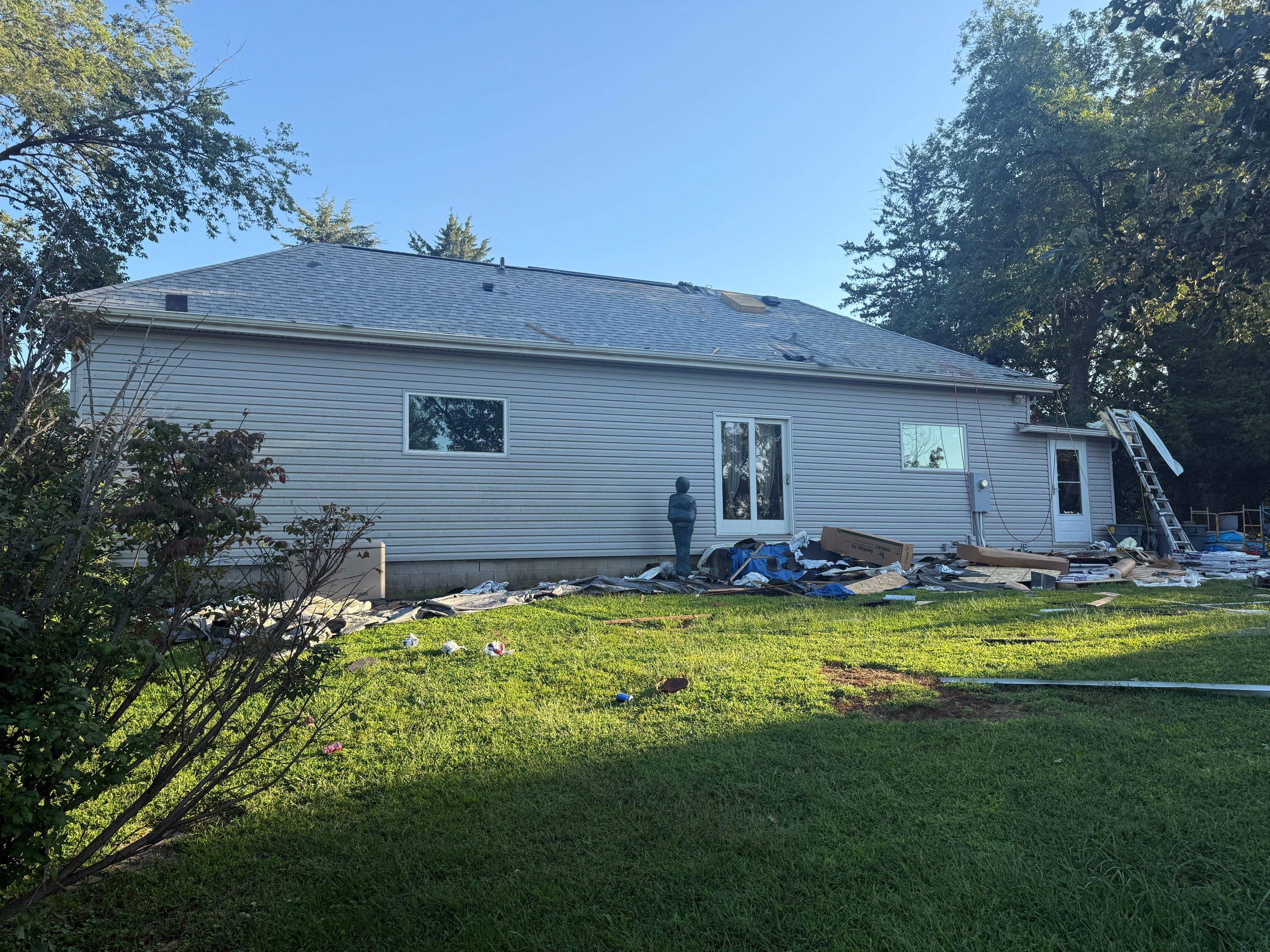 Asphalt Shingle and EPDM Membrane Roof Installation in Mineola by Star Home