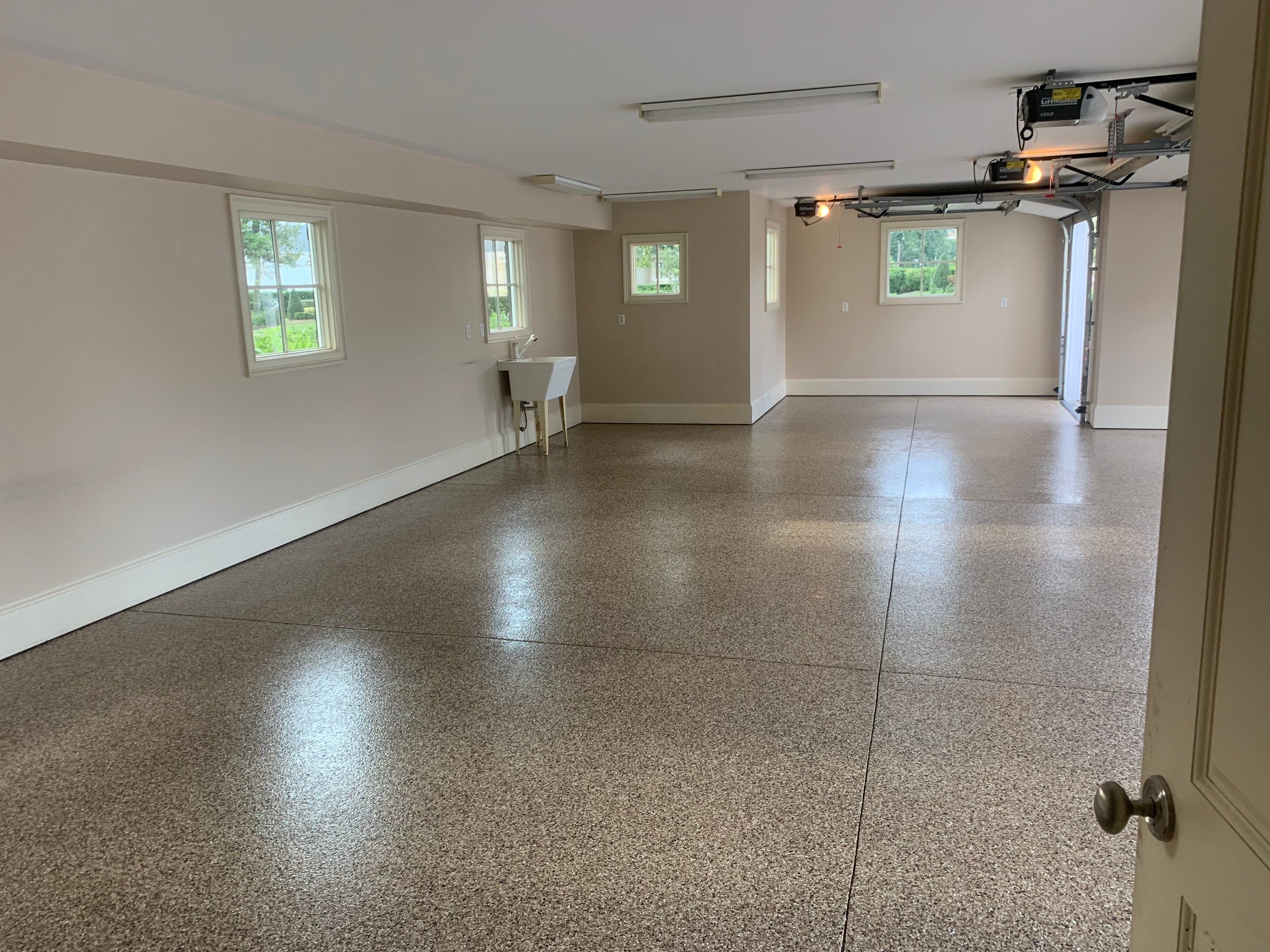 Garage TransFLOORmation using Sandstone by Innovative Concrete Coatings 