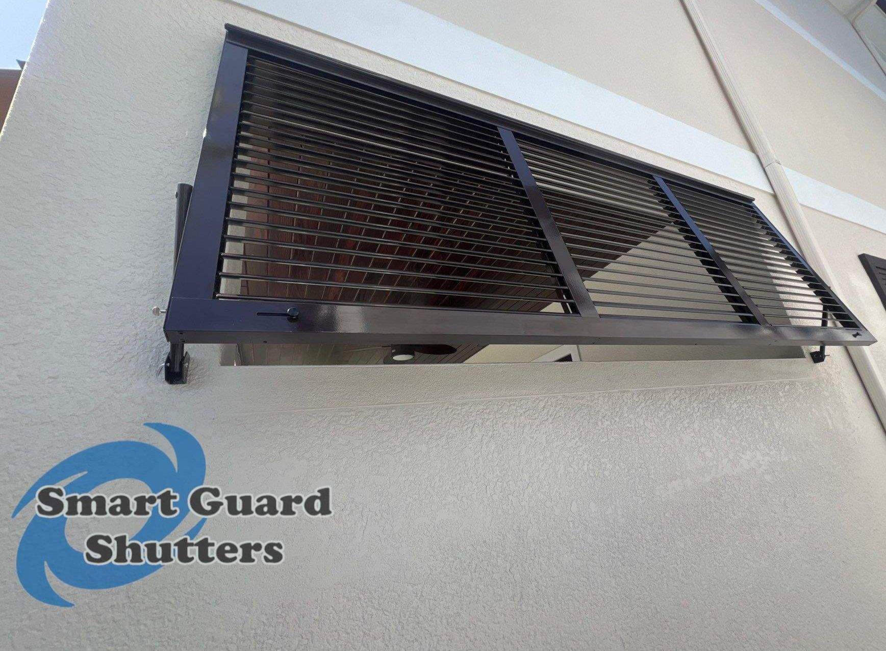 Impact Bahamas in Grey Brown  by Smart Guard Shutters