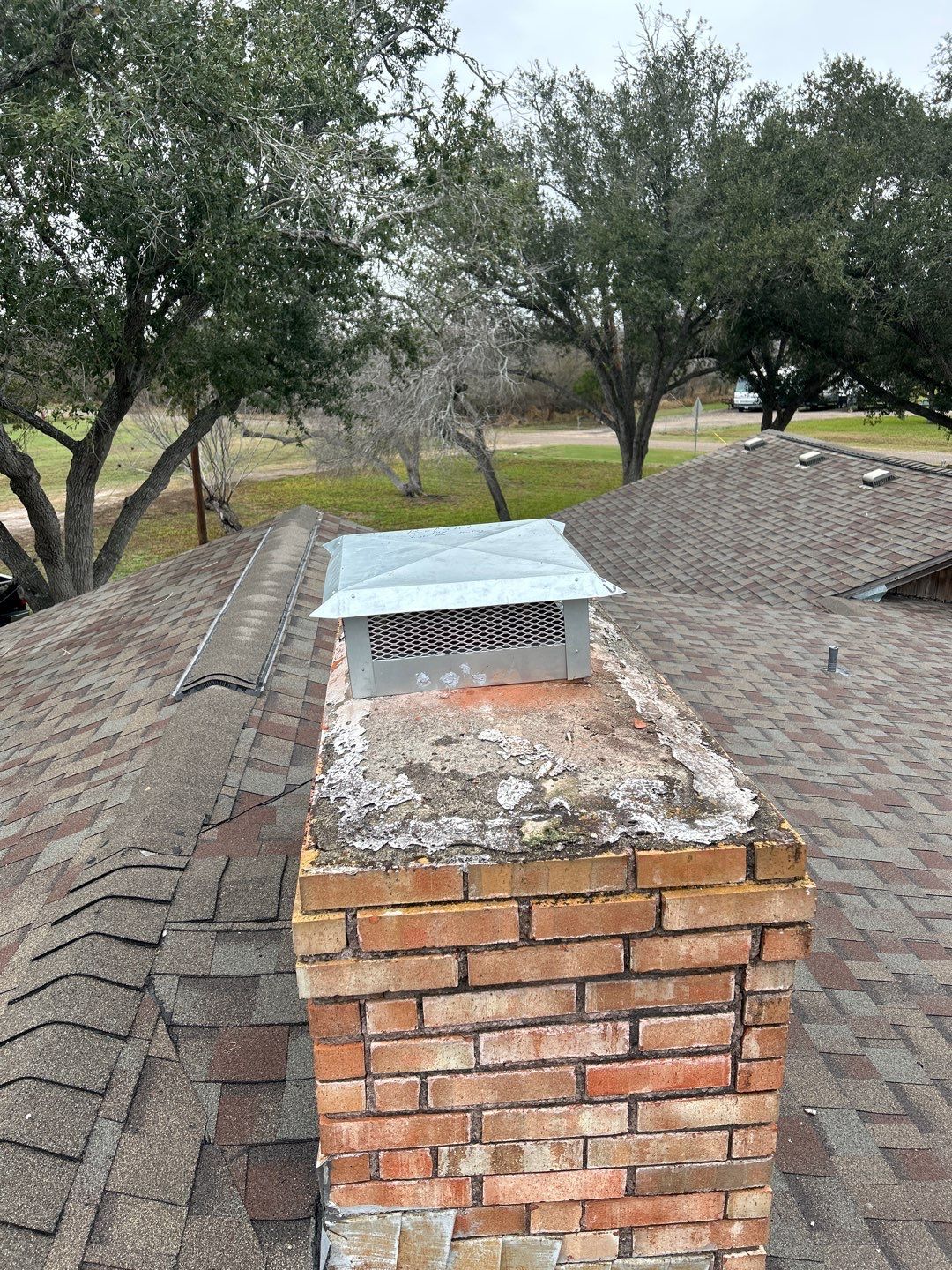 Residential Roofing Repair using Custom Fabricated Metal Spark Arrestor by Lighthouse Roofing