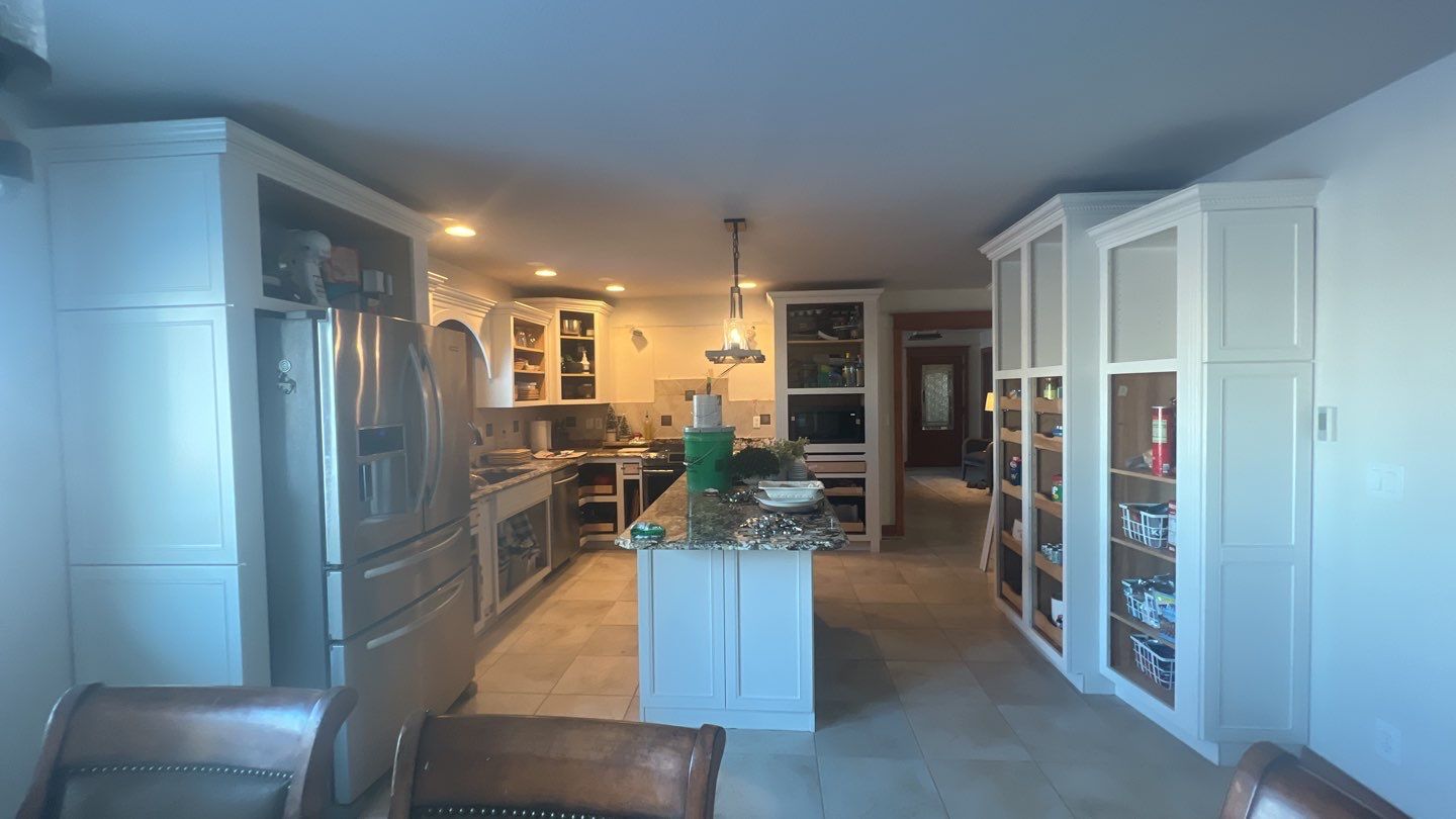 Built-ins and cabinets makeover using Sherwin Williams Paint by Cutting edge painting