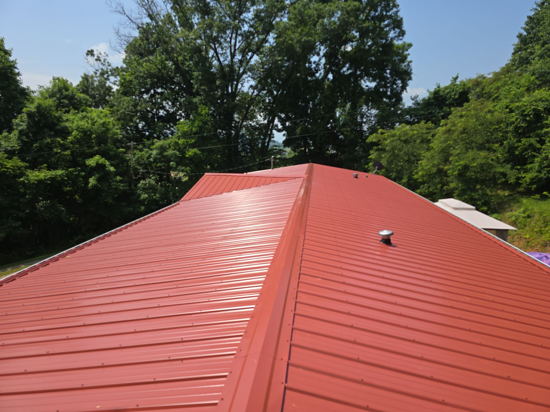 Barn Red Metal Roof by Omnia Roofing