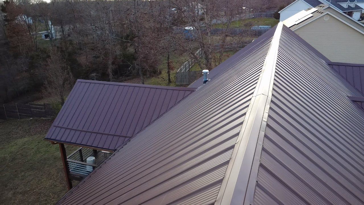 Residential Roofing Install - 26 Gauge M-Rib Metal - Color Brown  by Titan Commercial & Residential Roofing 