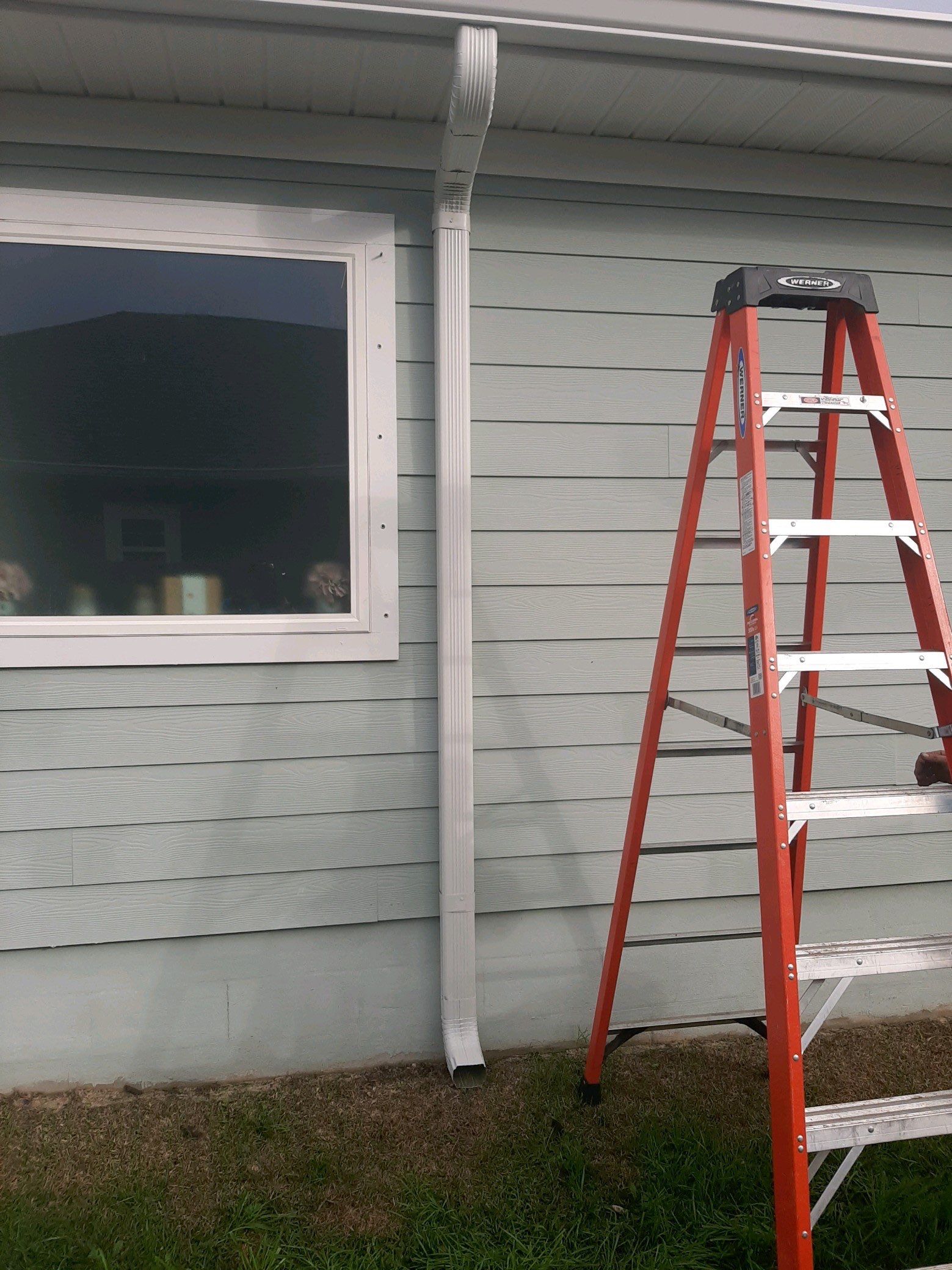 Gutter Installation Using White K-Style Seamless Gutters by Gutter Professors