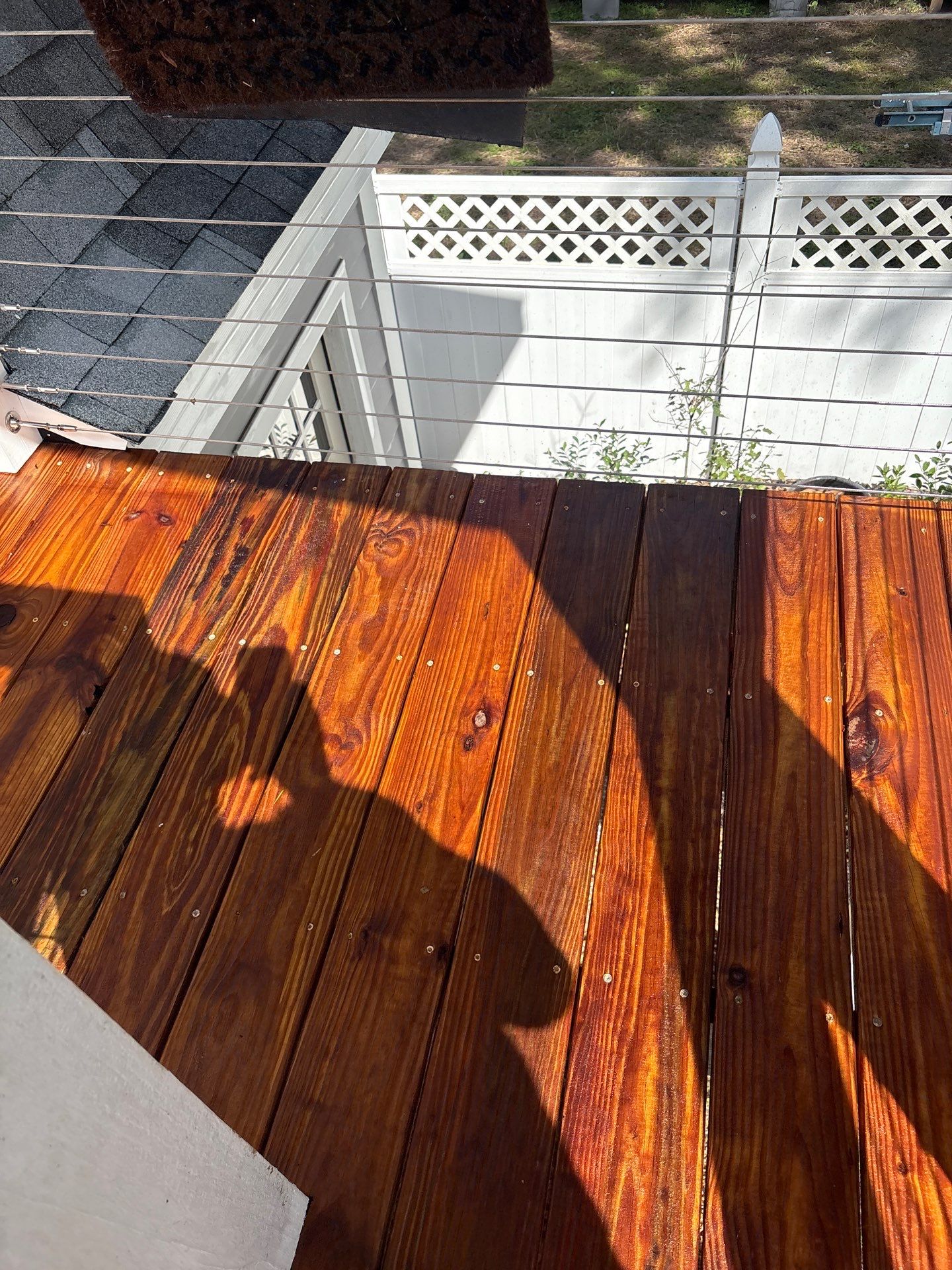 Wood Deck and Concrete Driveway using Wood and Concrete Sealant by DuraSeal