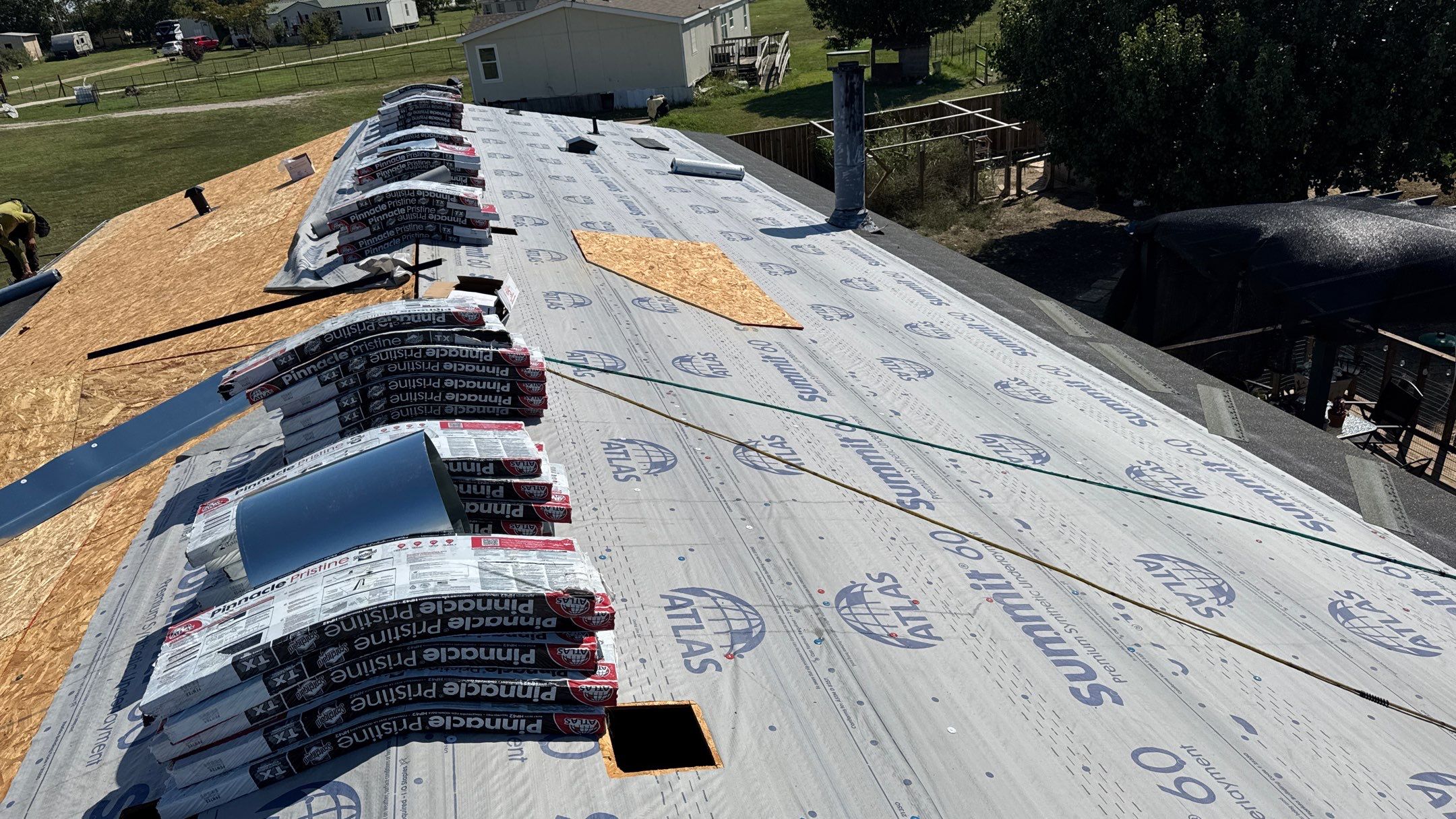 Residential Roofing Installation using ATLAS Pinnacle Pristine Shingles by Harvey Roofing & Construction