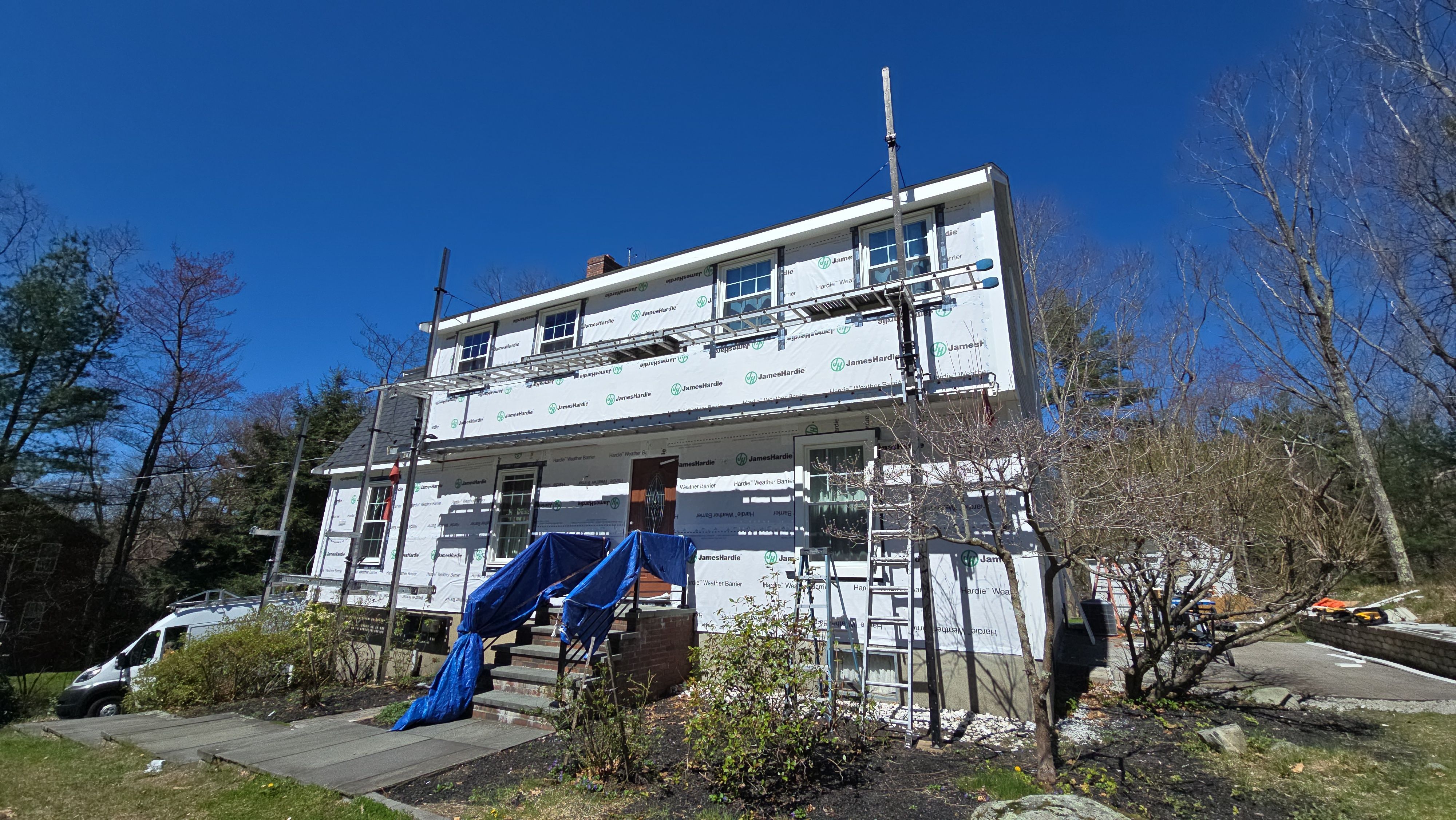 Custom window trim work and siding replacement in Dover, MA by UBrothers Construction