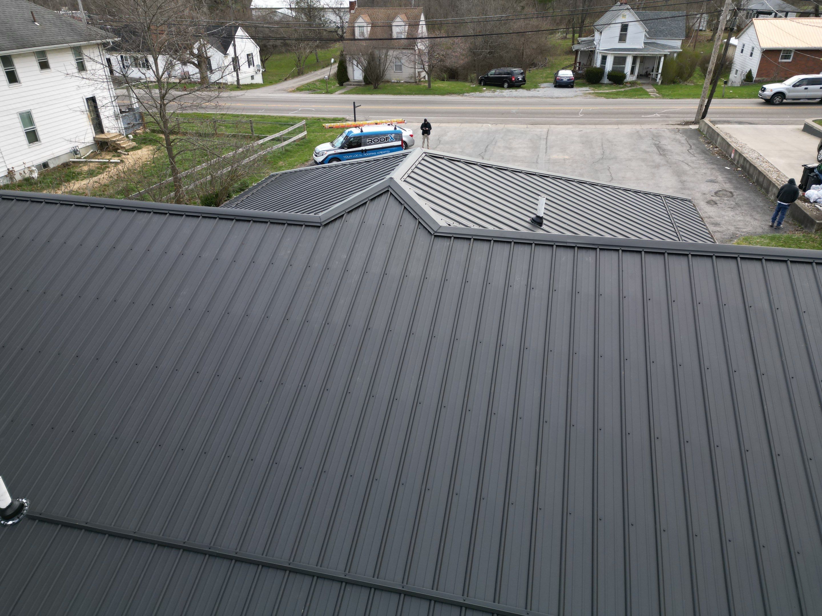 Commercial Roofing Installation using Performance Panel Metal - Frost Black by RoofX 