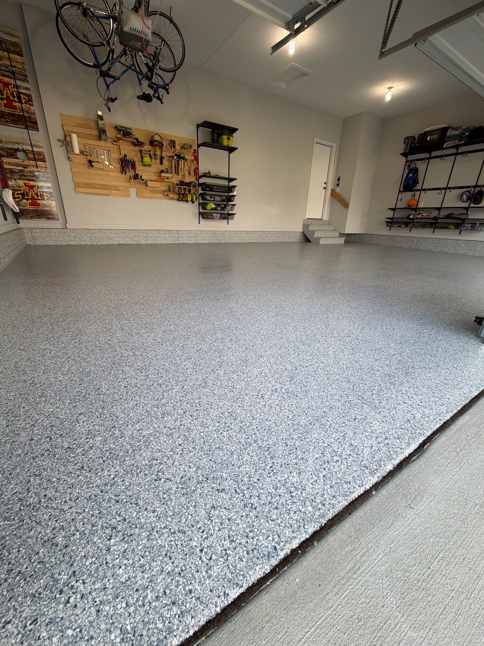 Waukee 3-Car Garage Transformation by Revival Concrete Coatings