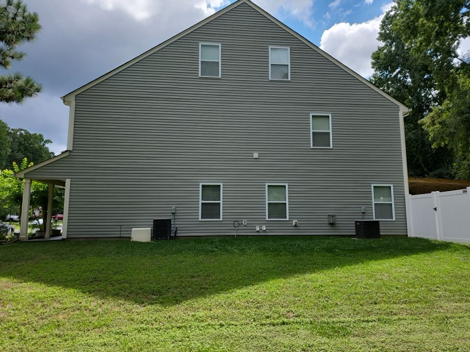 House Wash using cleaner by Power Wash Masters LLC