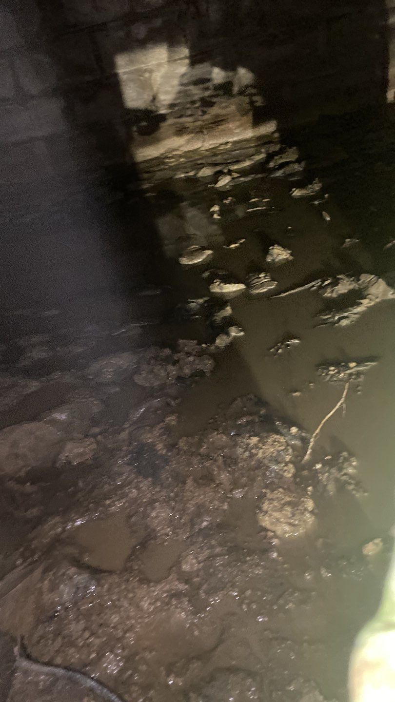 Crawl space encapsulation and Waterproofing using GrateDrain Waterproofing System by Toledo Basement Repair 