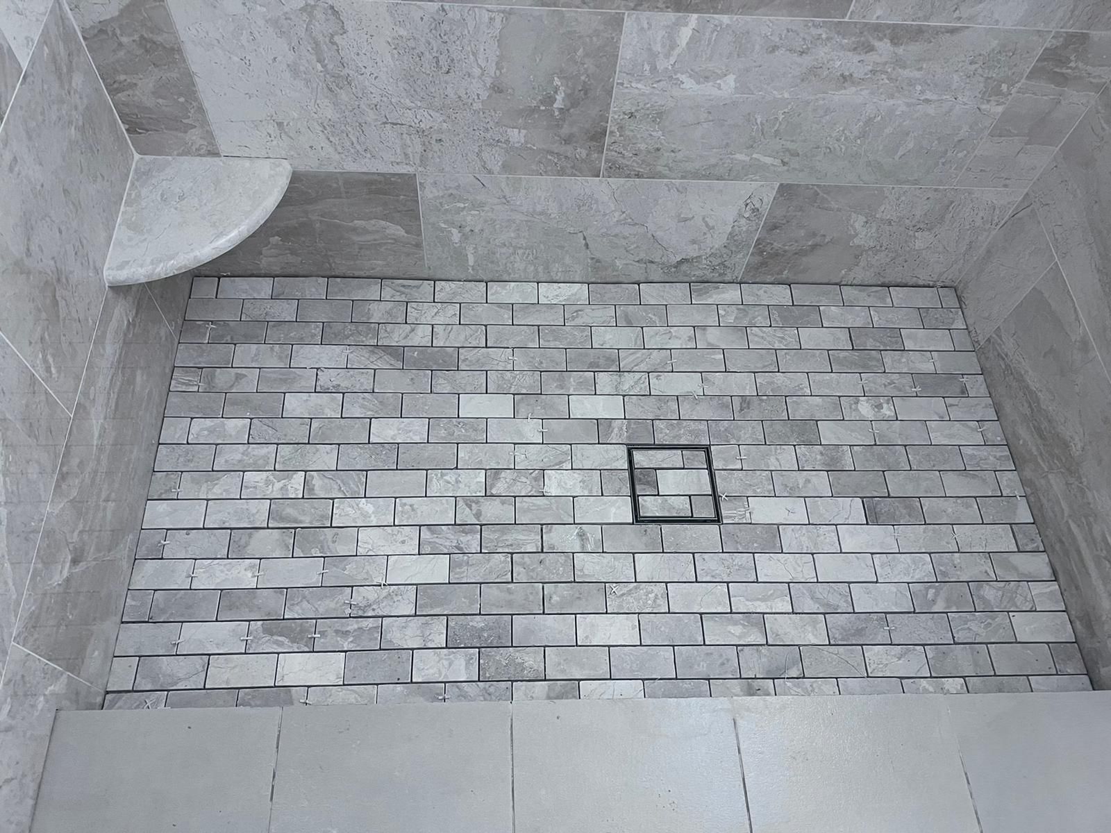 Bathroom Remodel using Tile by Home Concepts Construction