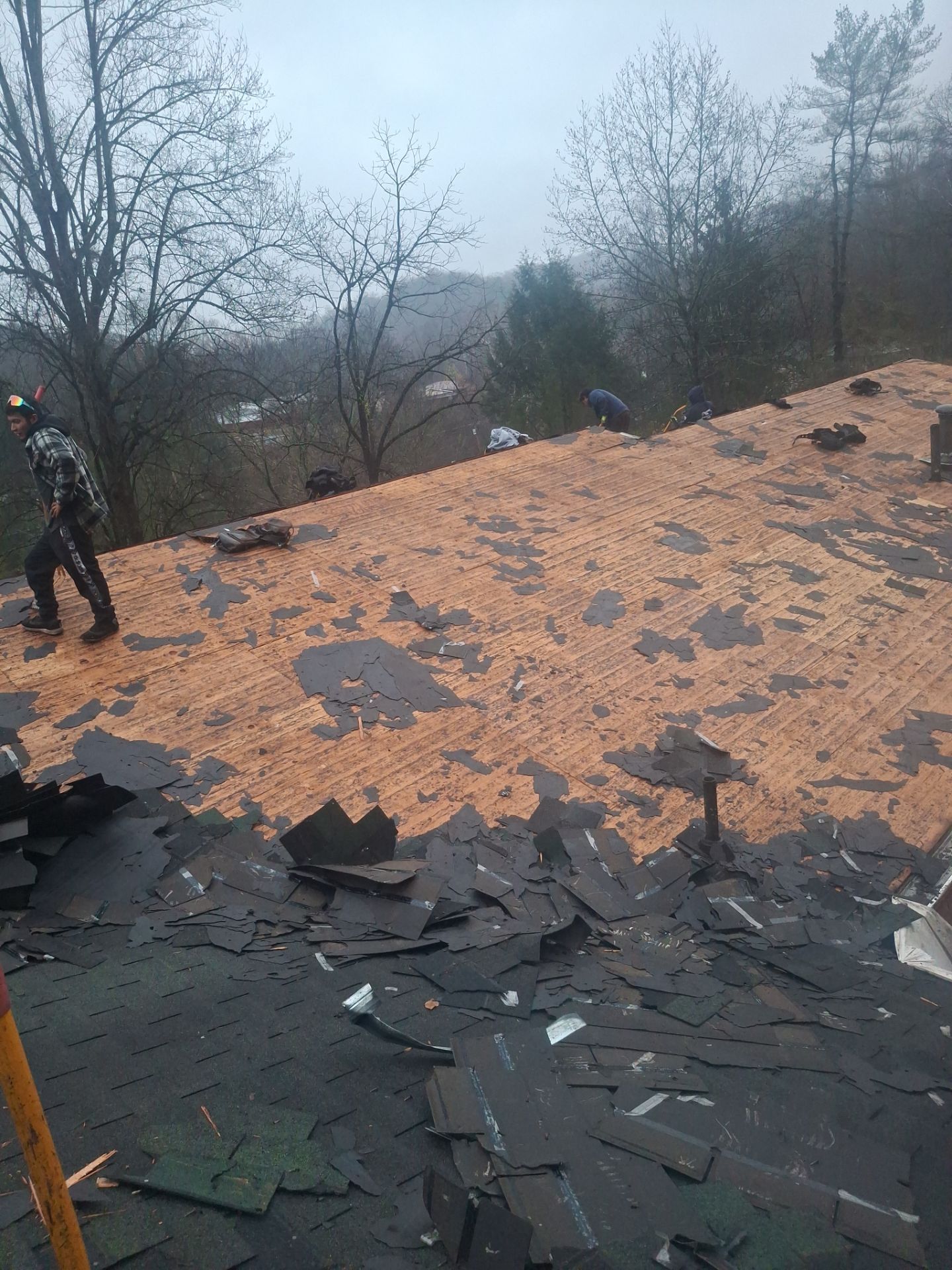 Residential Roofing Installation using GAF Timberline HDZ Charcoal by Rainstoppers Roofing