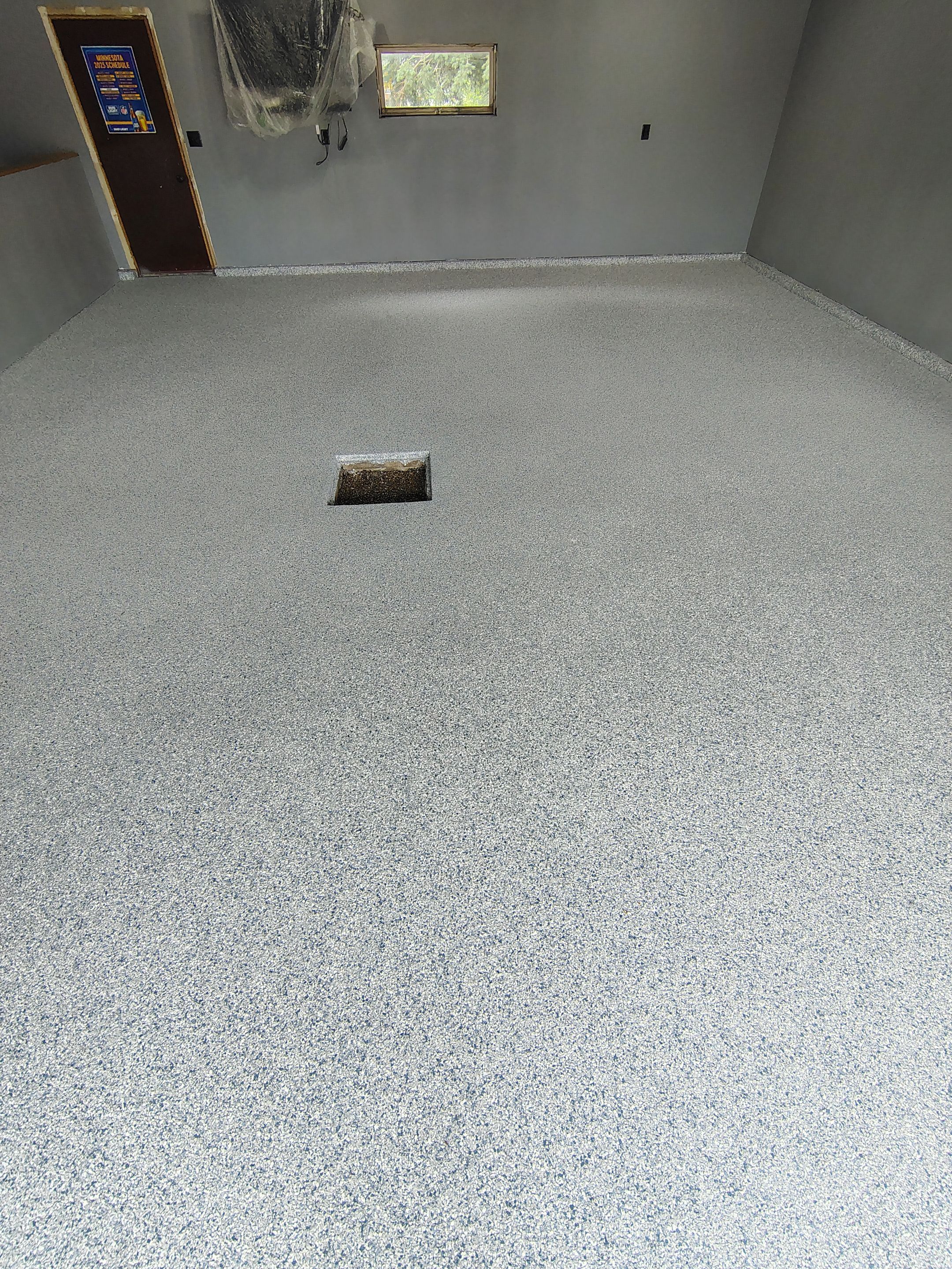 Garage Floor Concrete Coating and Surface Restoration in Colman by Select Painting, Coatings & Garage Cabinets