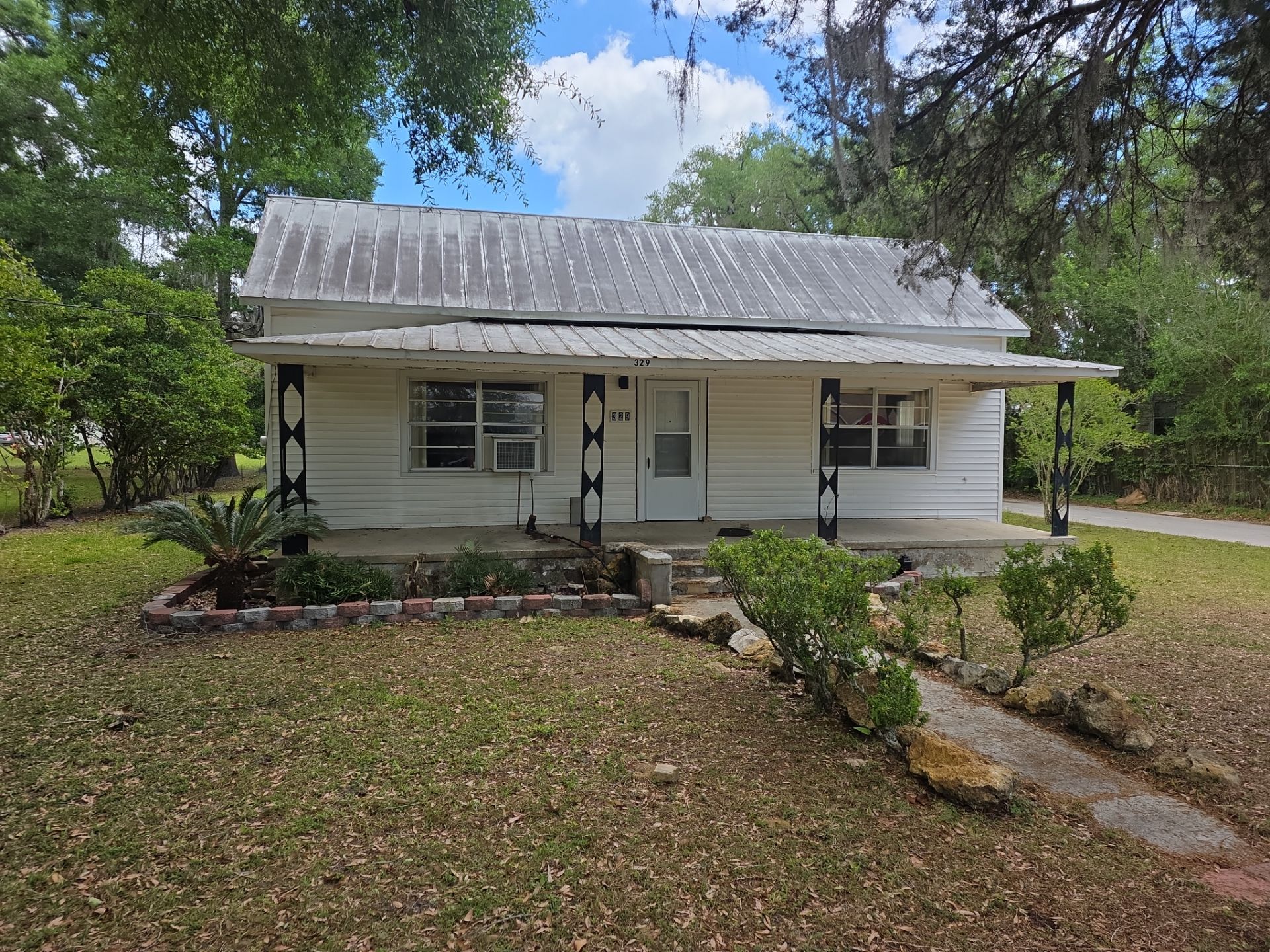White Vinyl Window Replacement for Residential Home in Williston by Windows & Doors Store