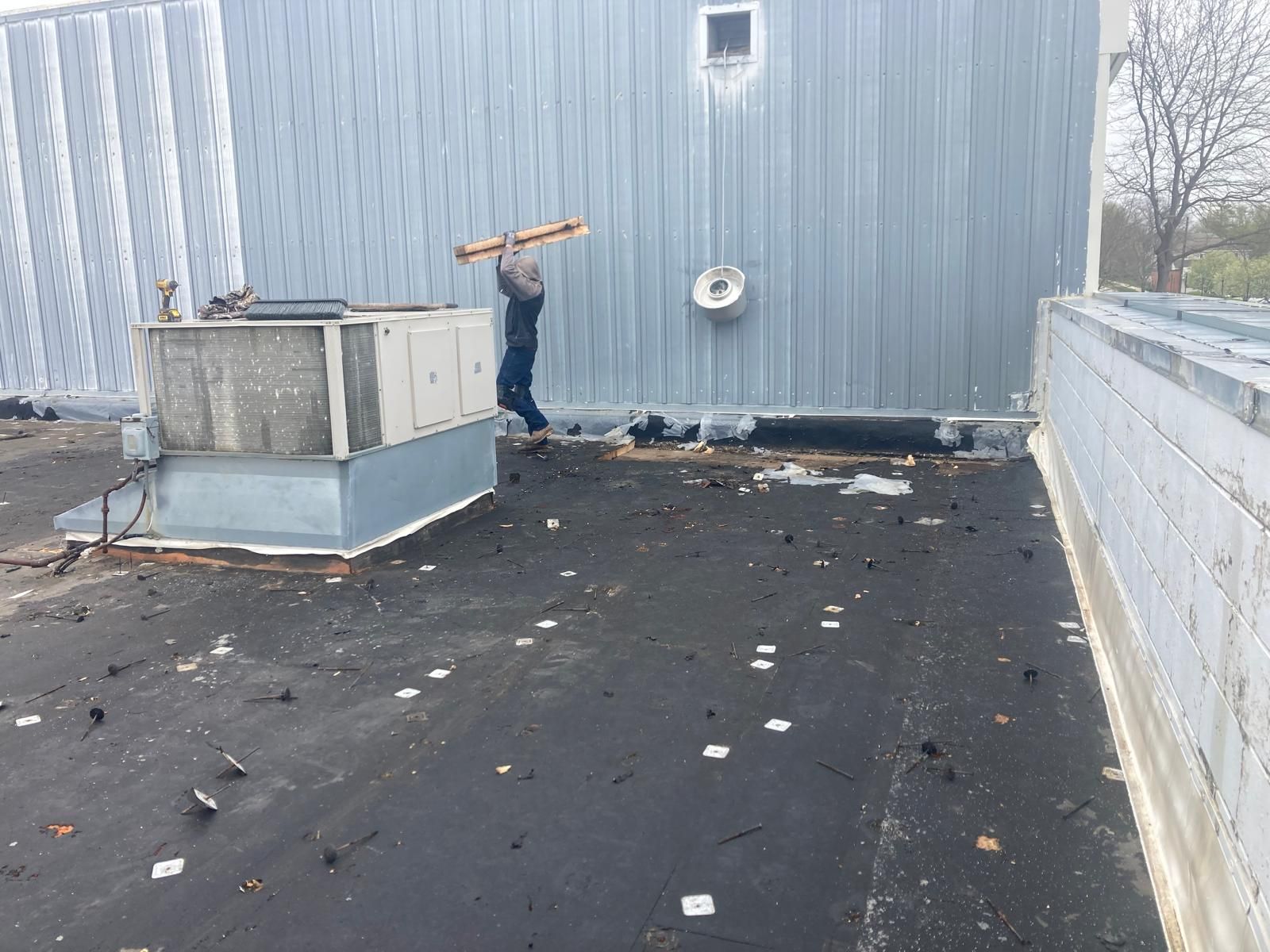 Full Roof Tear-off with new Code ISO insulation and 50 Mil Membrane by Grell Roofing, LLC