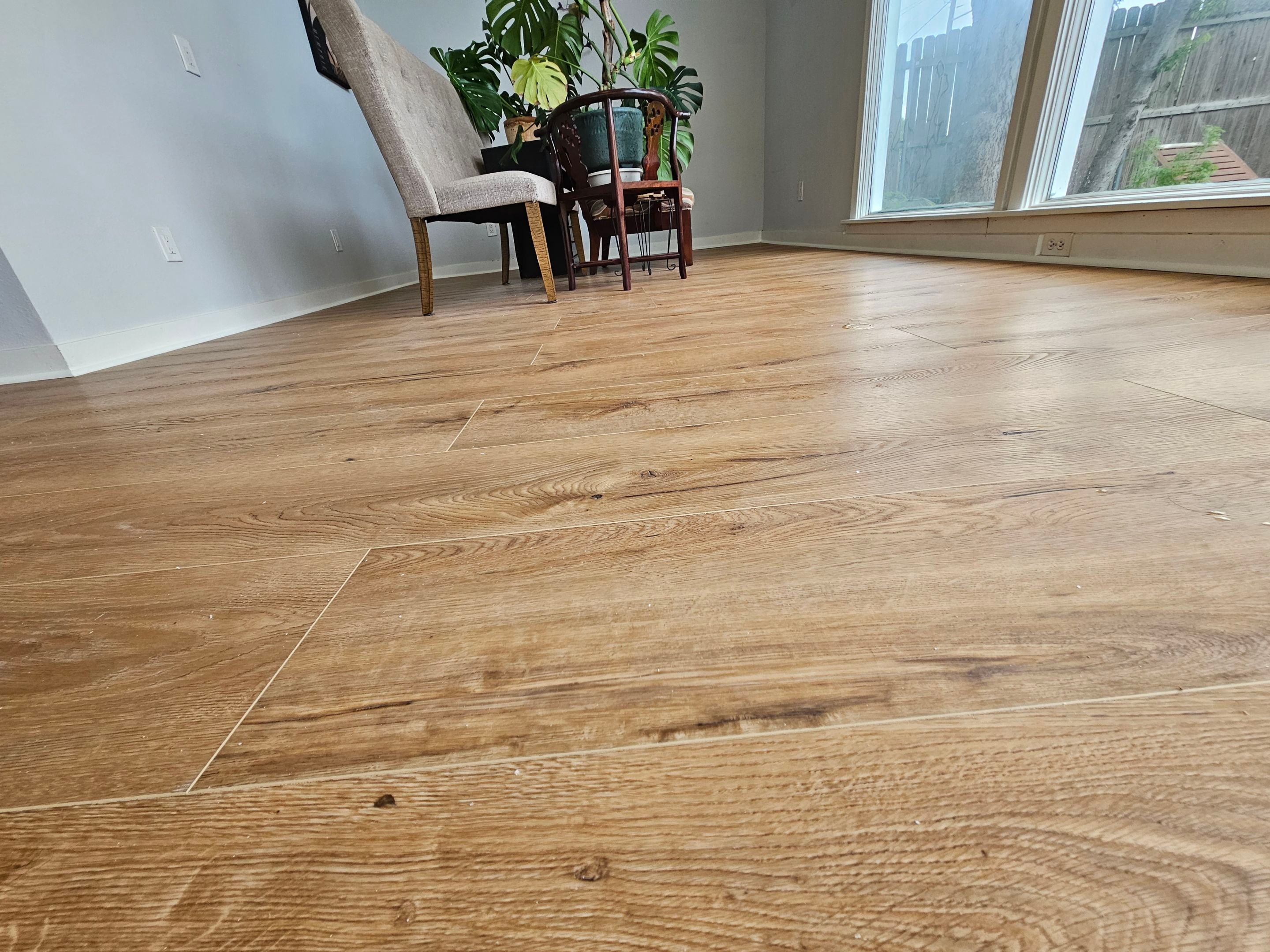 Laminate floor & fence by EL-GC LLC 