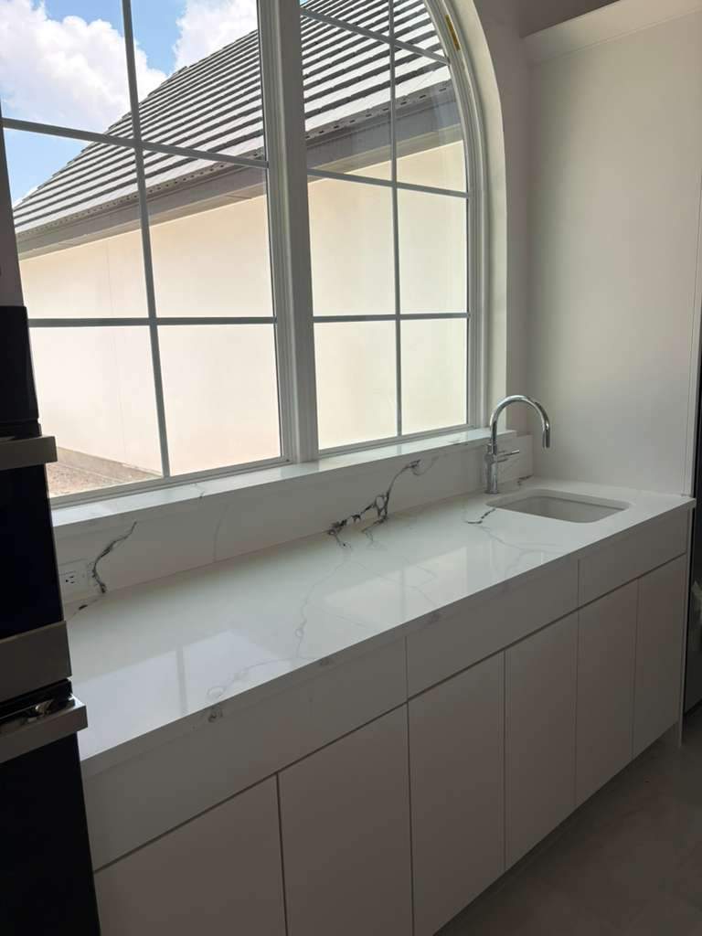 A home with a mix of quartz options by Mena stone surfaces