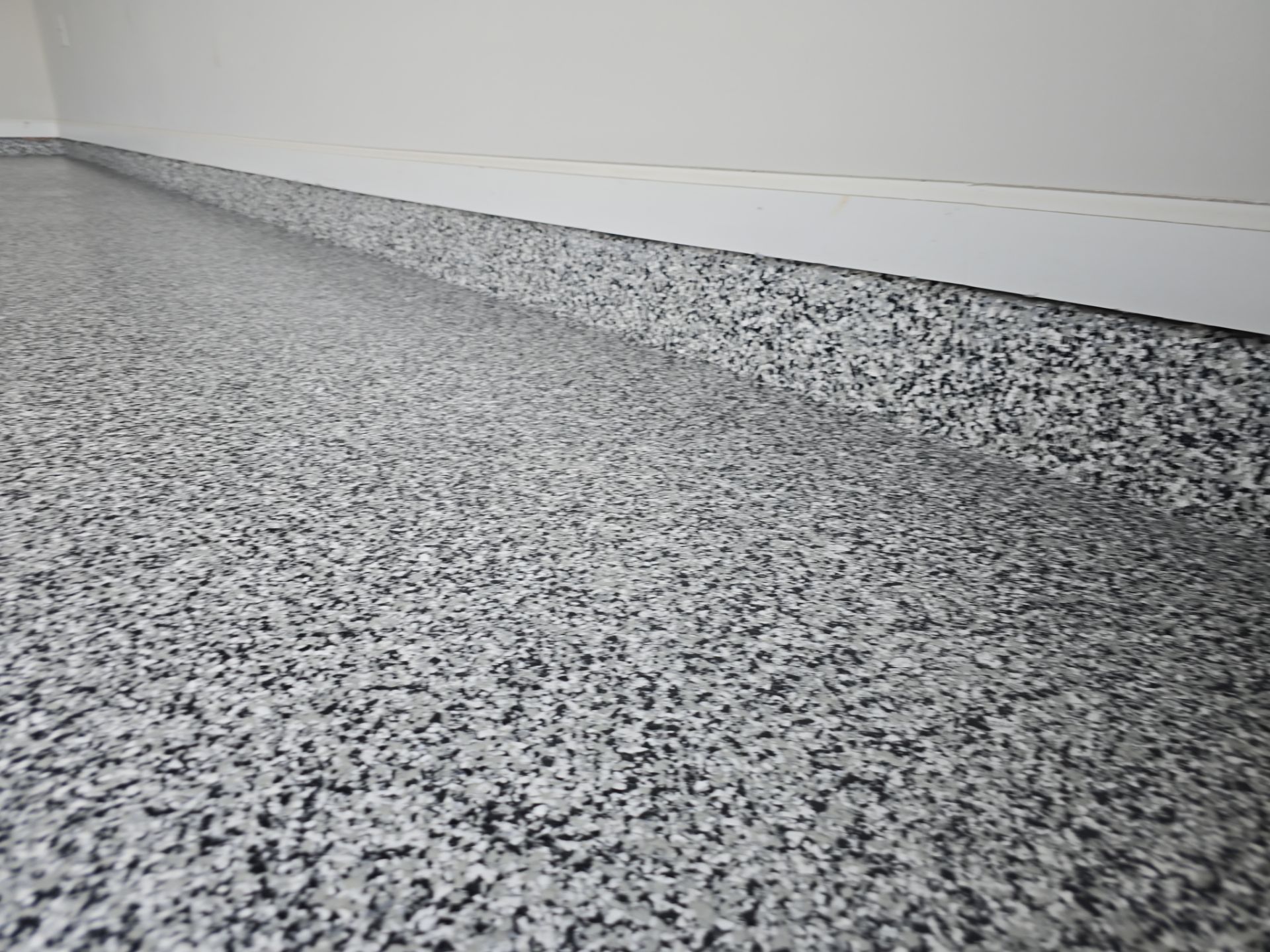 Garage floor transformation in Snellville by Opus Renovations 