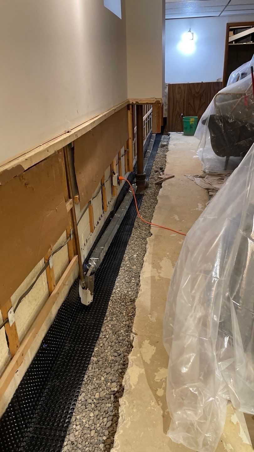 Drain Tile, Sump Pump & Buried Discharge in Columbia Heights by Waterproofing Northeast