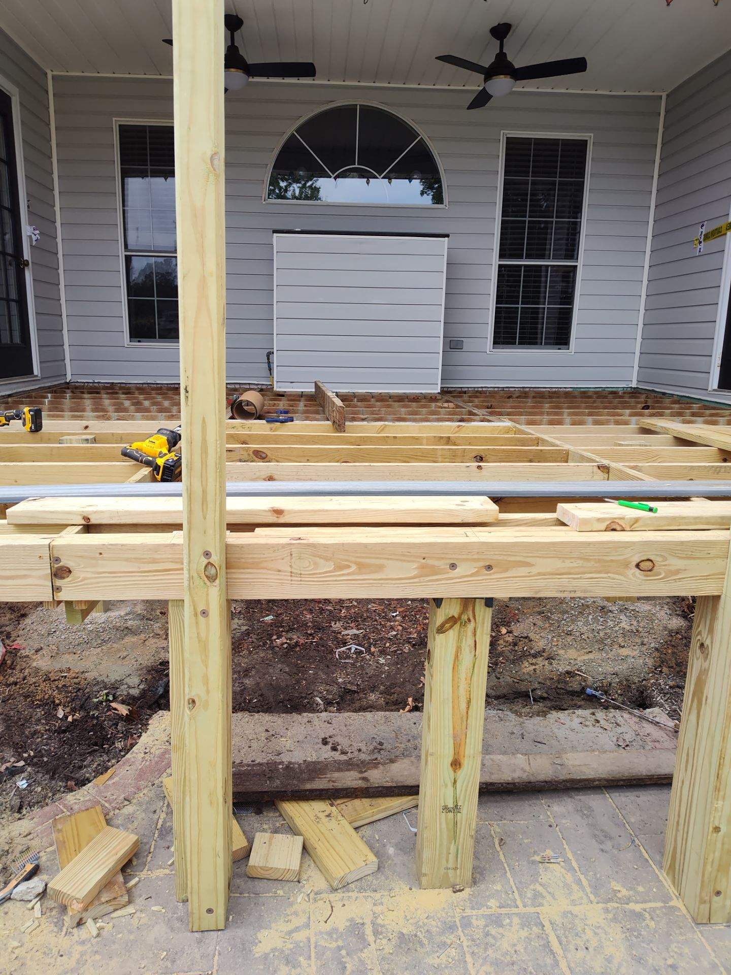 Outside porch and concreate work by Cornerstone Home Builders, LLC