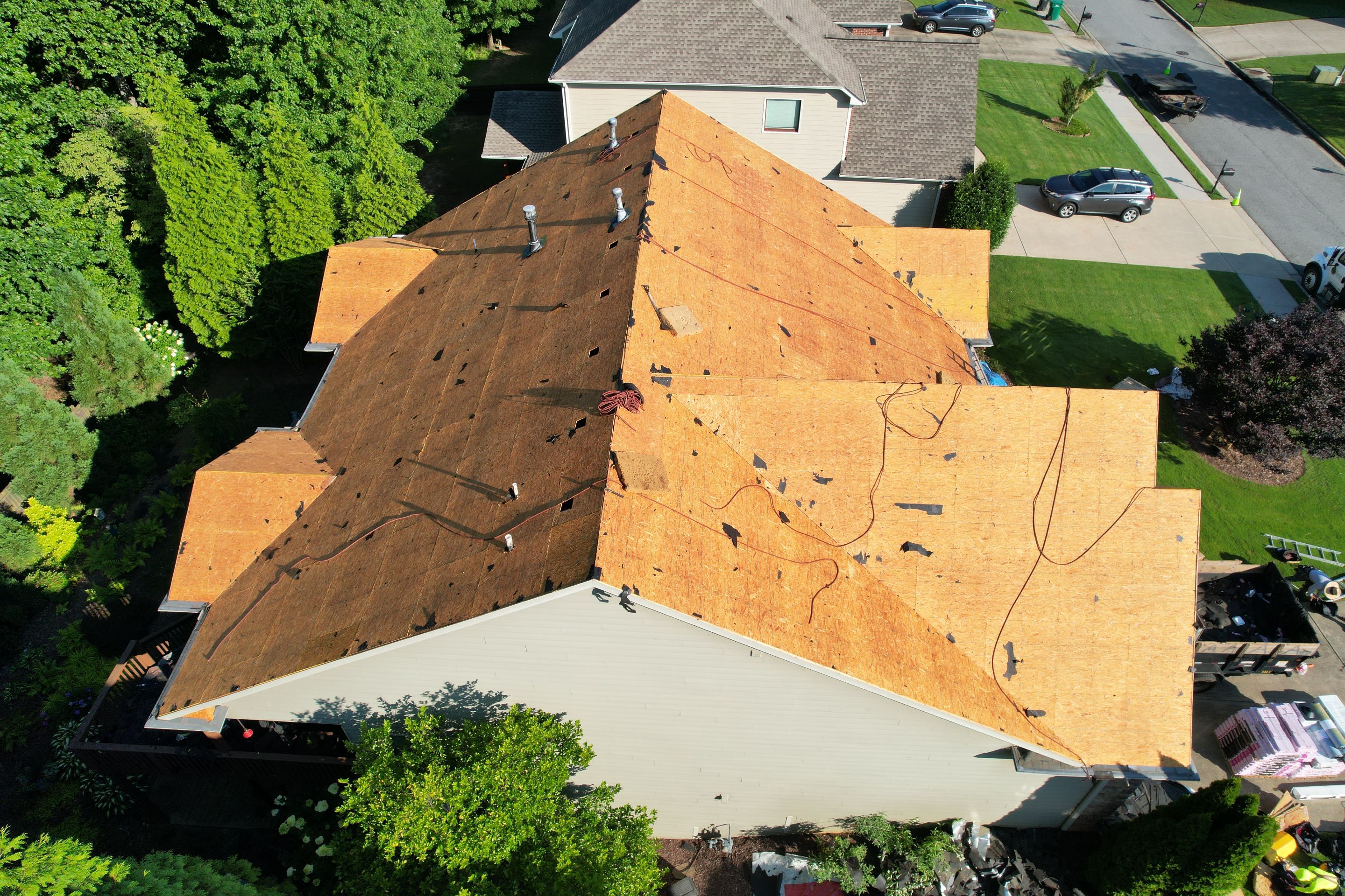 Residential Roofing Installation using Owens Corning Quary Gray by Inspector Roofing and Restoration
