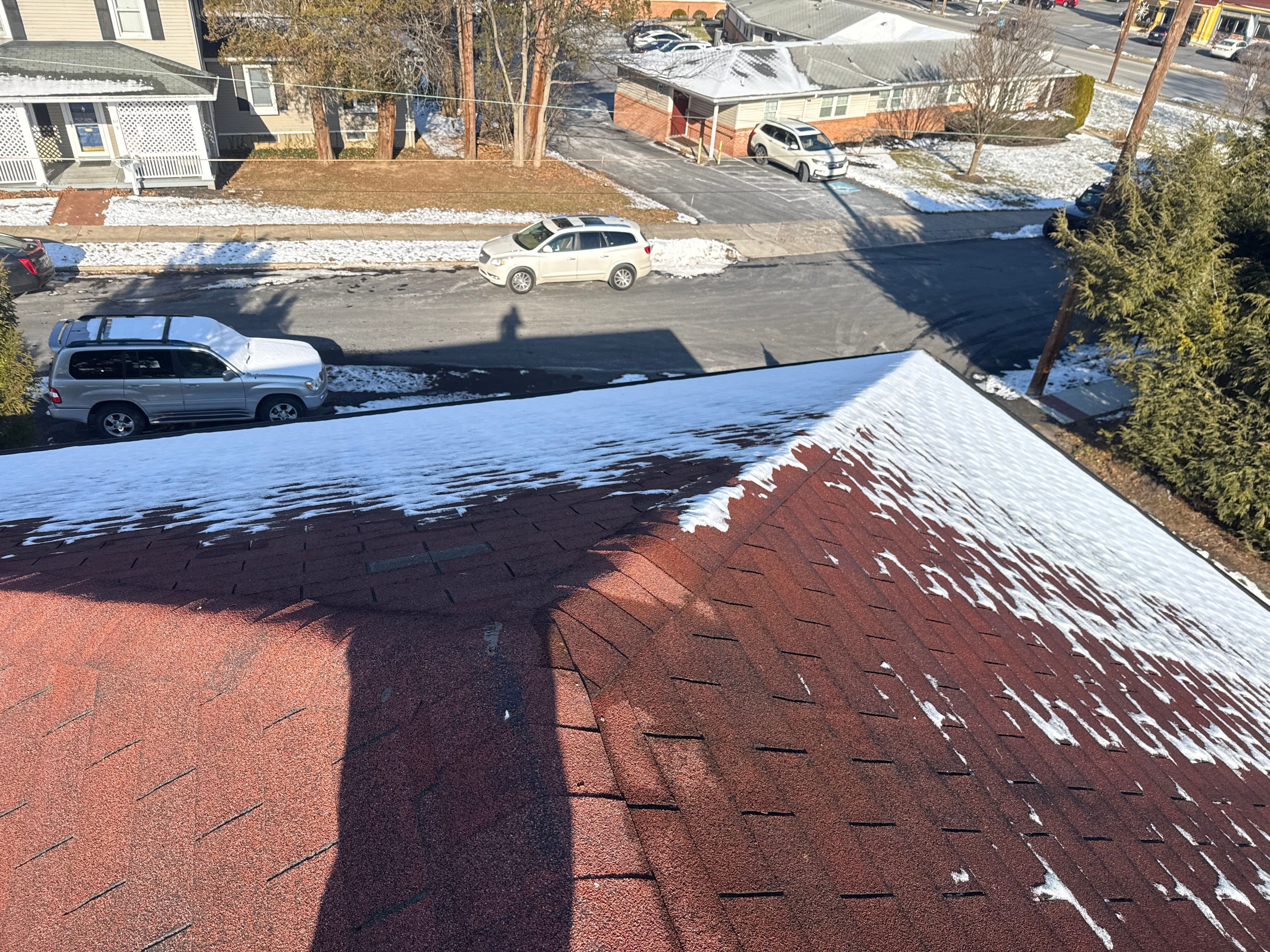 Red Metal Roofing Upgrade for Brick Home by Esh Builders