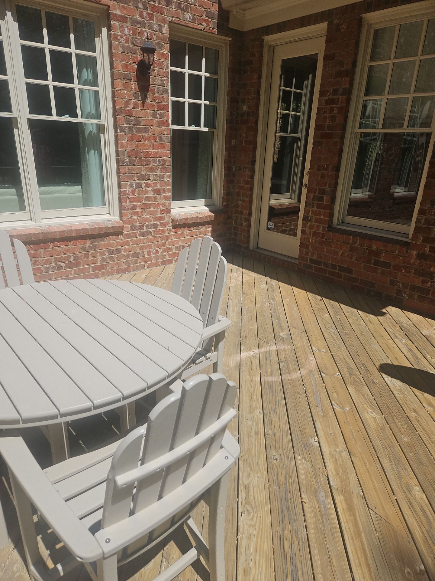 Deck Resurface using Deckorators Summit Series and Deckorators ALX Contemporary railing by Nelson Exteriors 