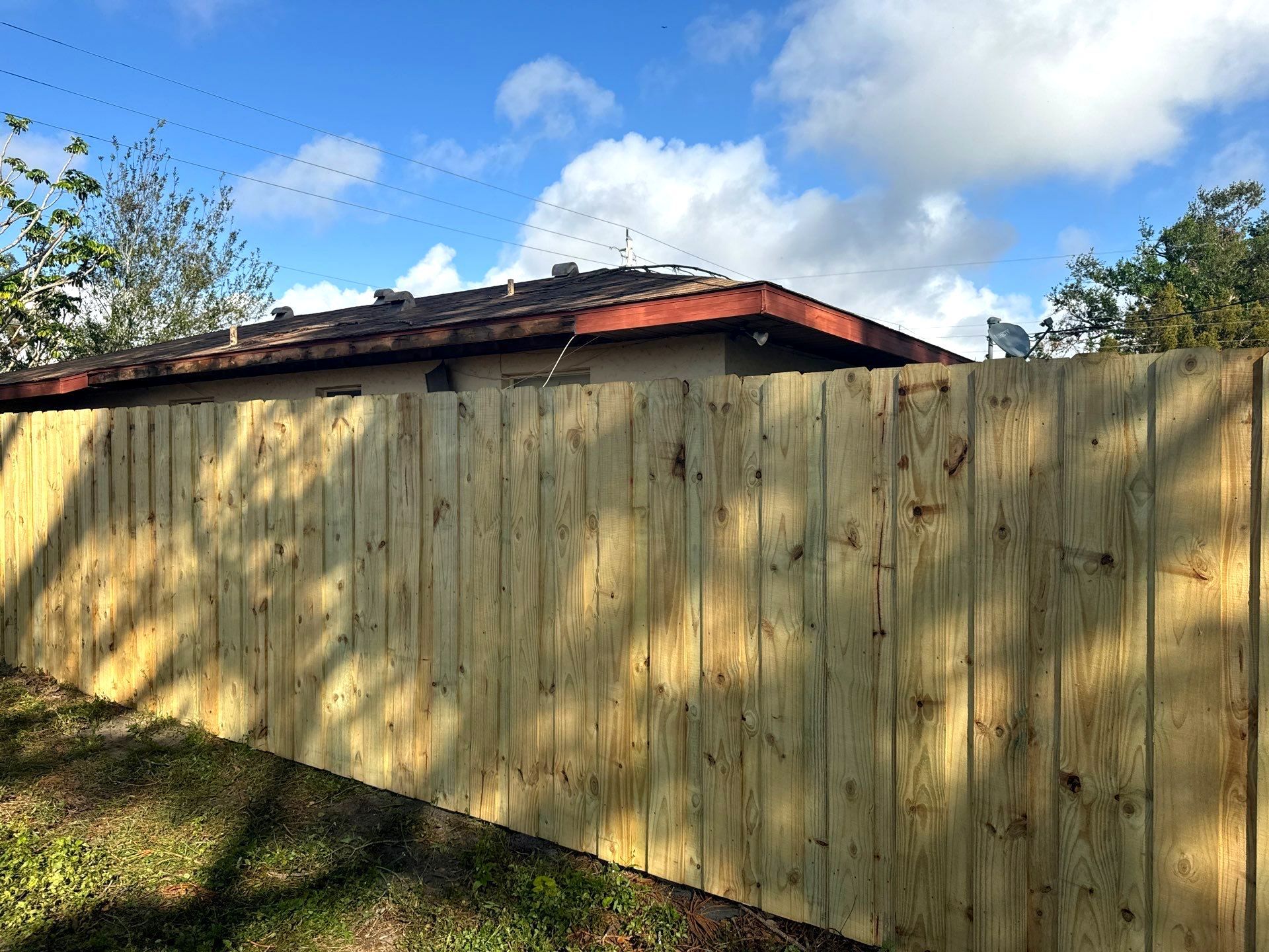 Wood Fence Installation using 6Ft Pressure Treated Wood Board On Board Privacy Fence by Asap fence and gates, LLC