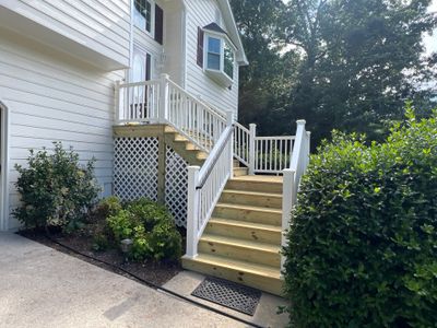 Front Entrance Deck Stair Replacement with White Vinyl Railings in Lawrenceville