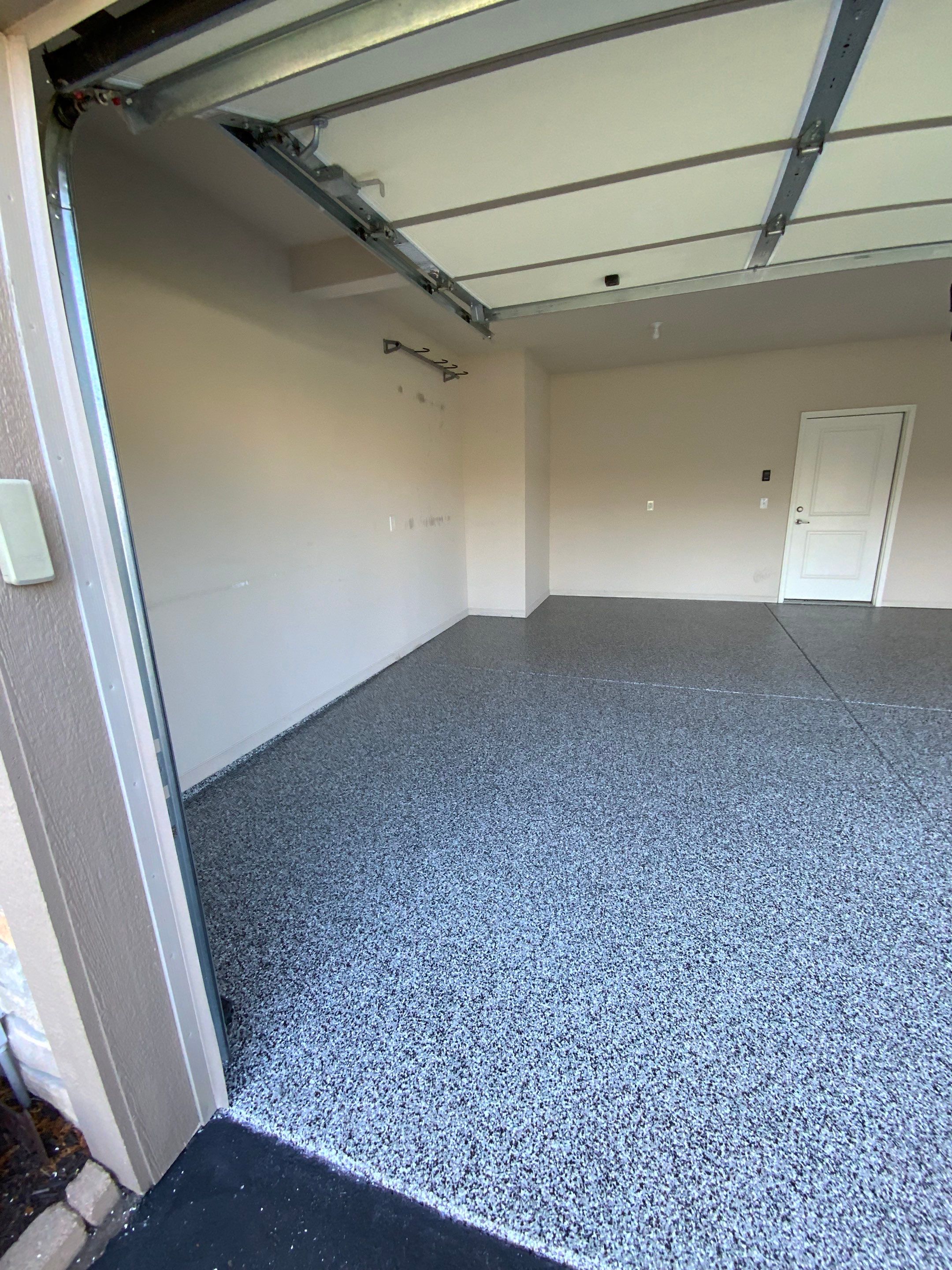 Garage coating and organization in Mishawaka!  by Innovative Spaces / Innovative Concrete Coatings
