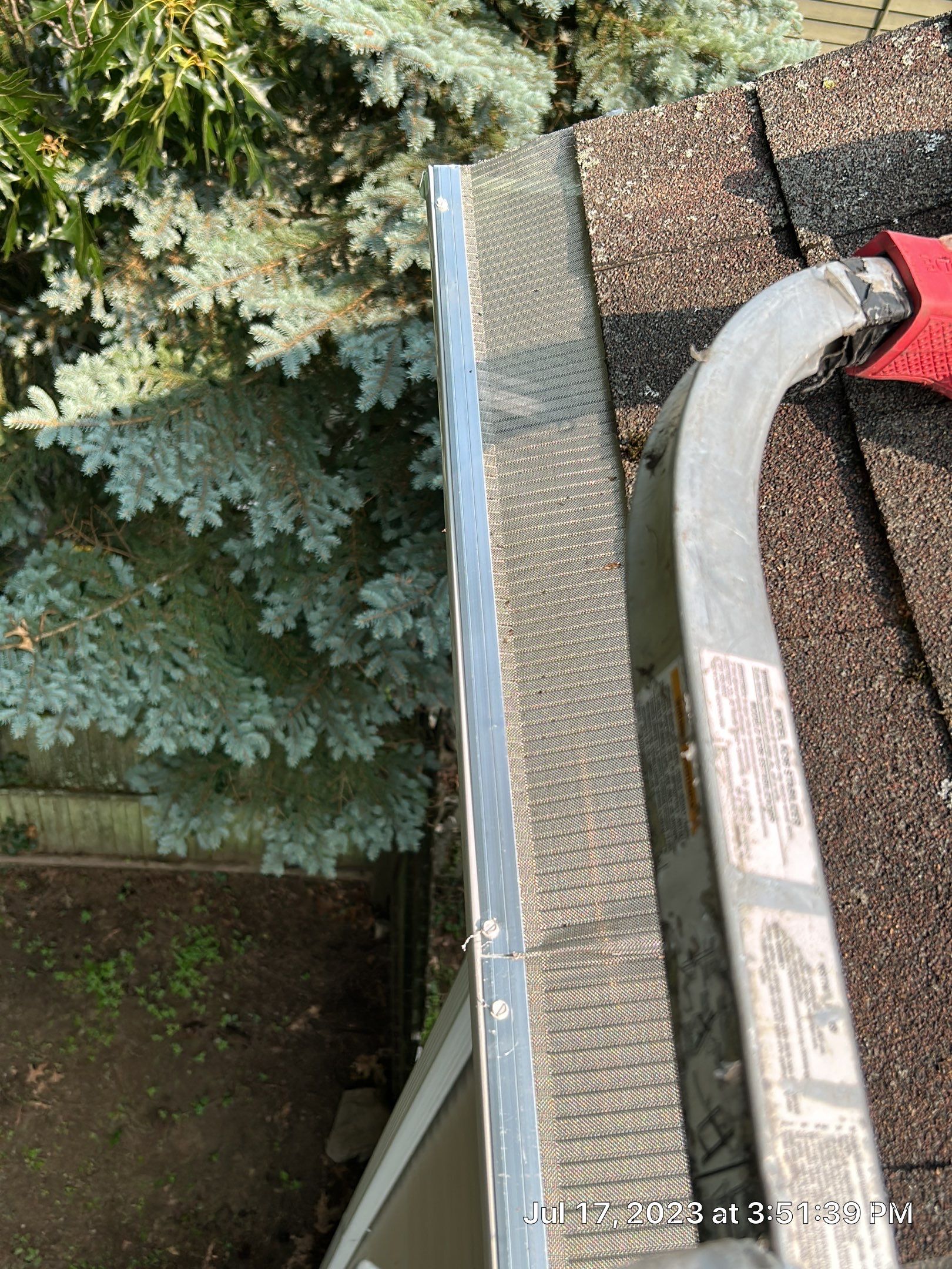 Gutter Installation using 5k White gutters by A Plus Exterior