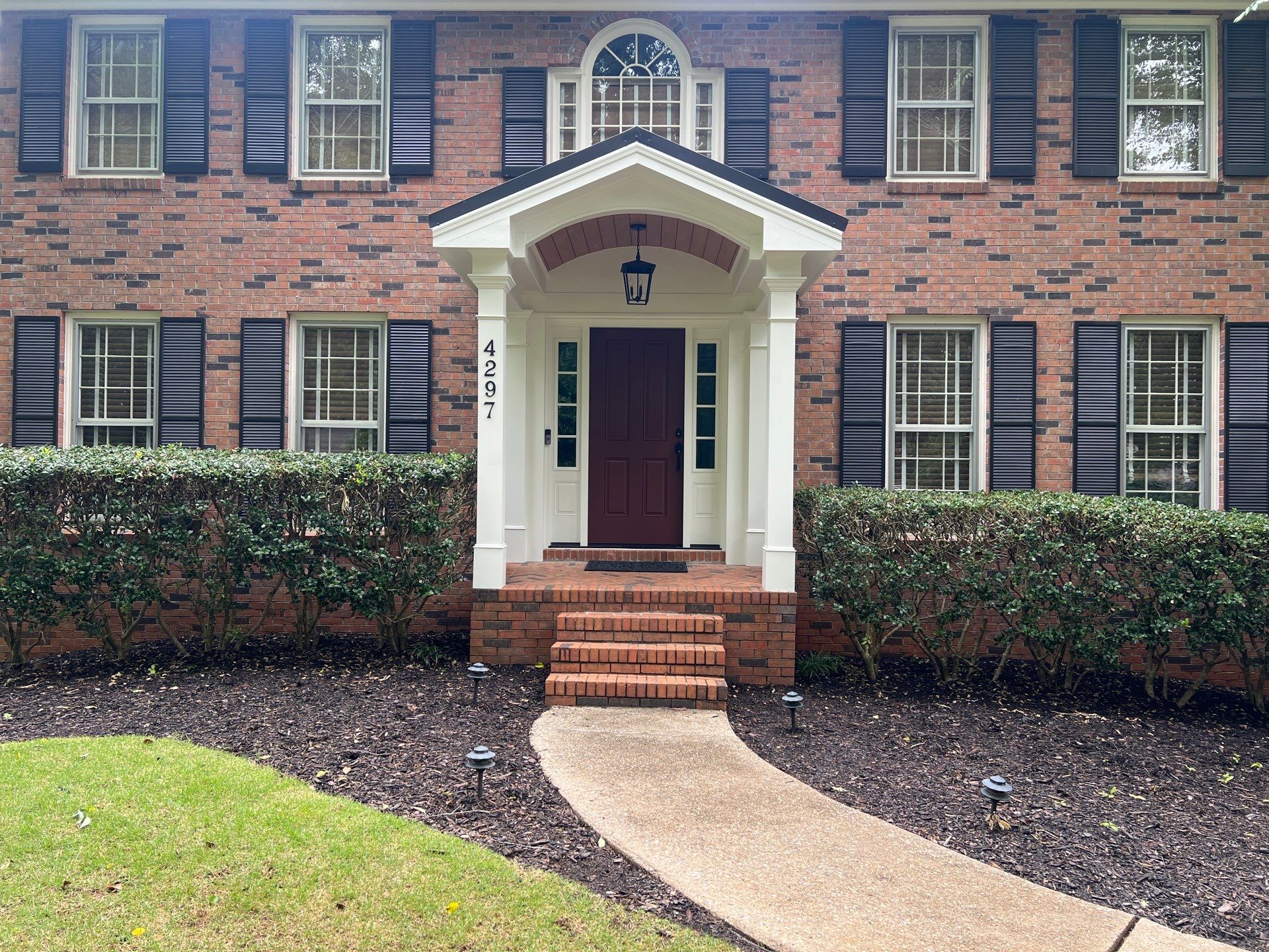 Exterior Entryway and Trim Renovation for Smyrna Brick Colonial by Swift Home Renovations