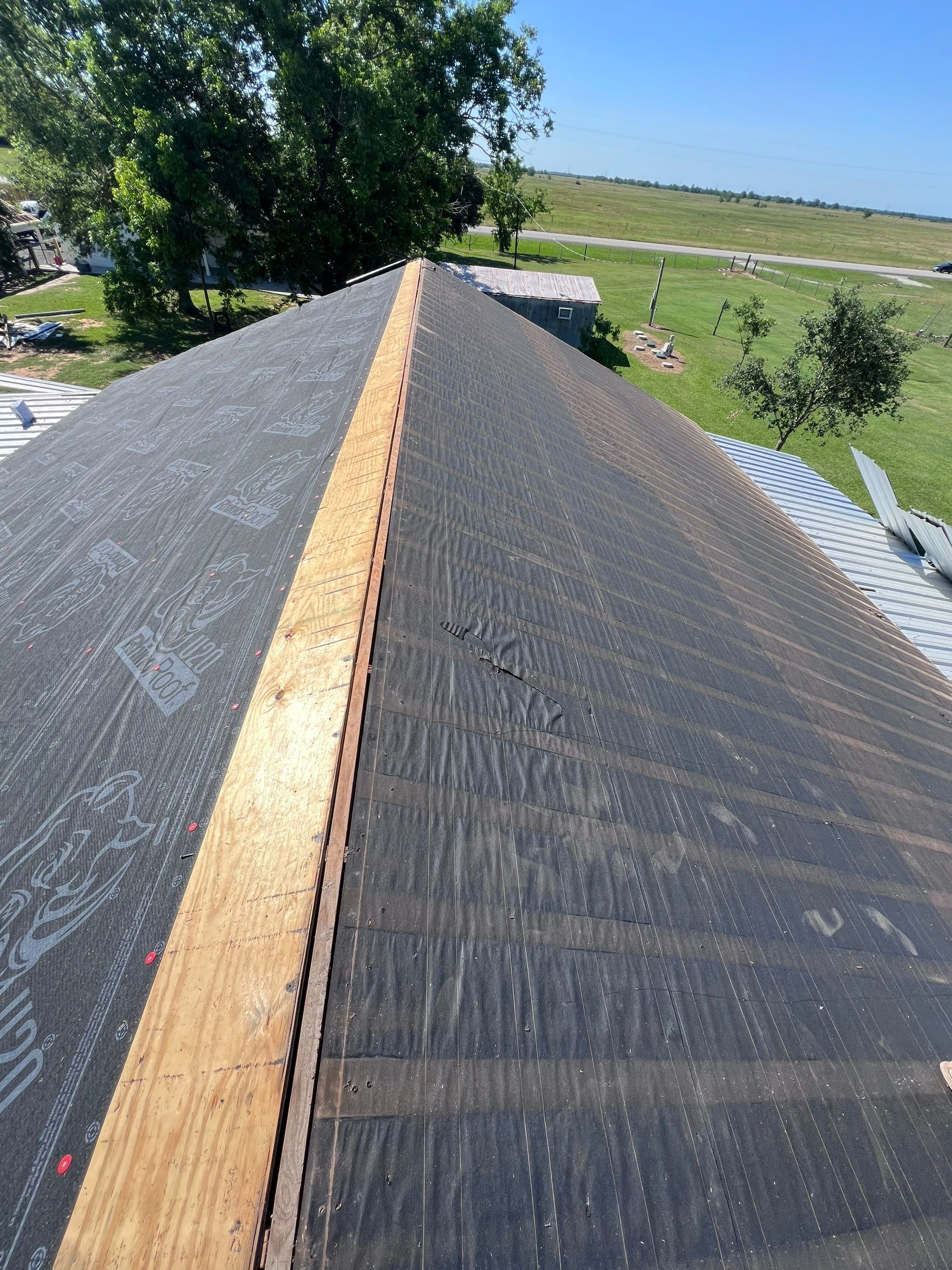 Residential Roofing Installation using Metal by Roof Repair Company