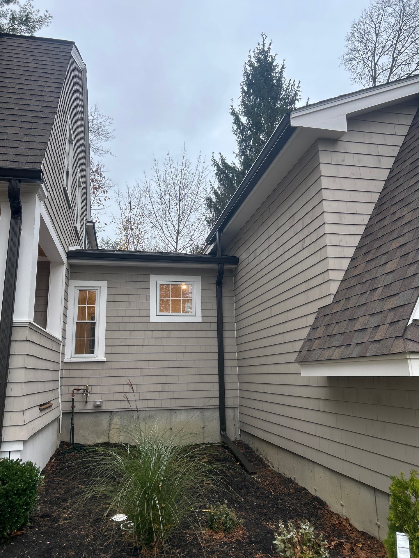 Andover Complete Gutter System with T-Rex Guards & Valley Splashguard by Mighty Dog Roofing of Greater Middlesex County