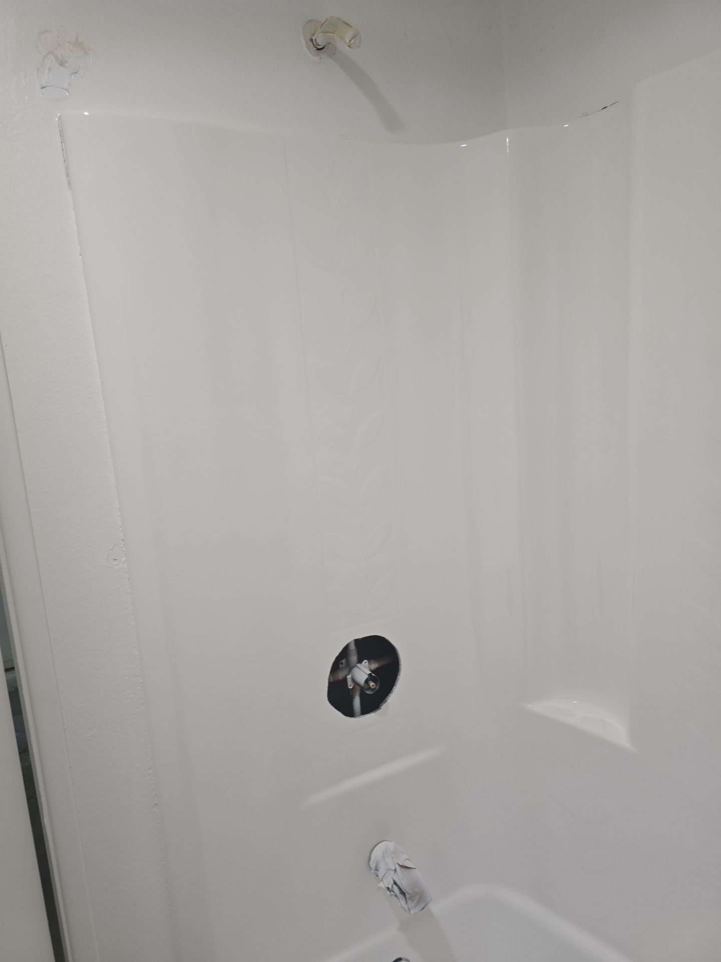 Scope of Work: Installation of Shower, Toilet, Plumbing, Kitchen Sink, and Fixtures by Us Plumbing 