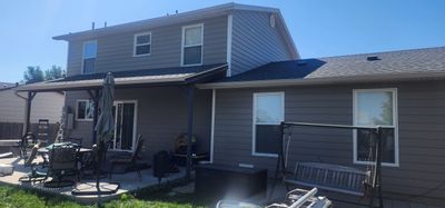 Add some Insulation and upgrade the Siding at the same time