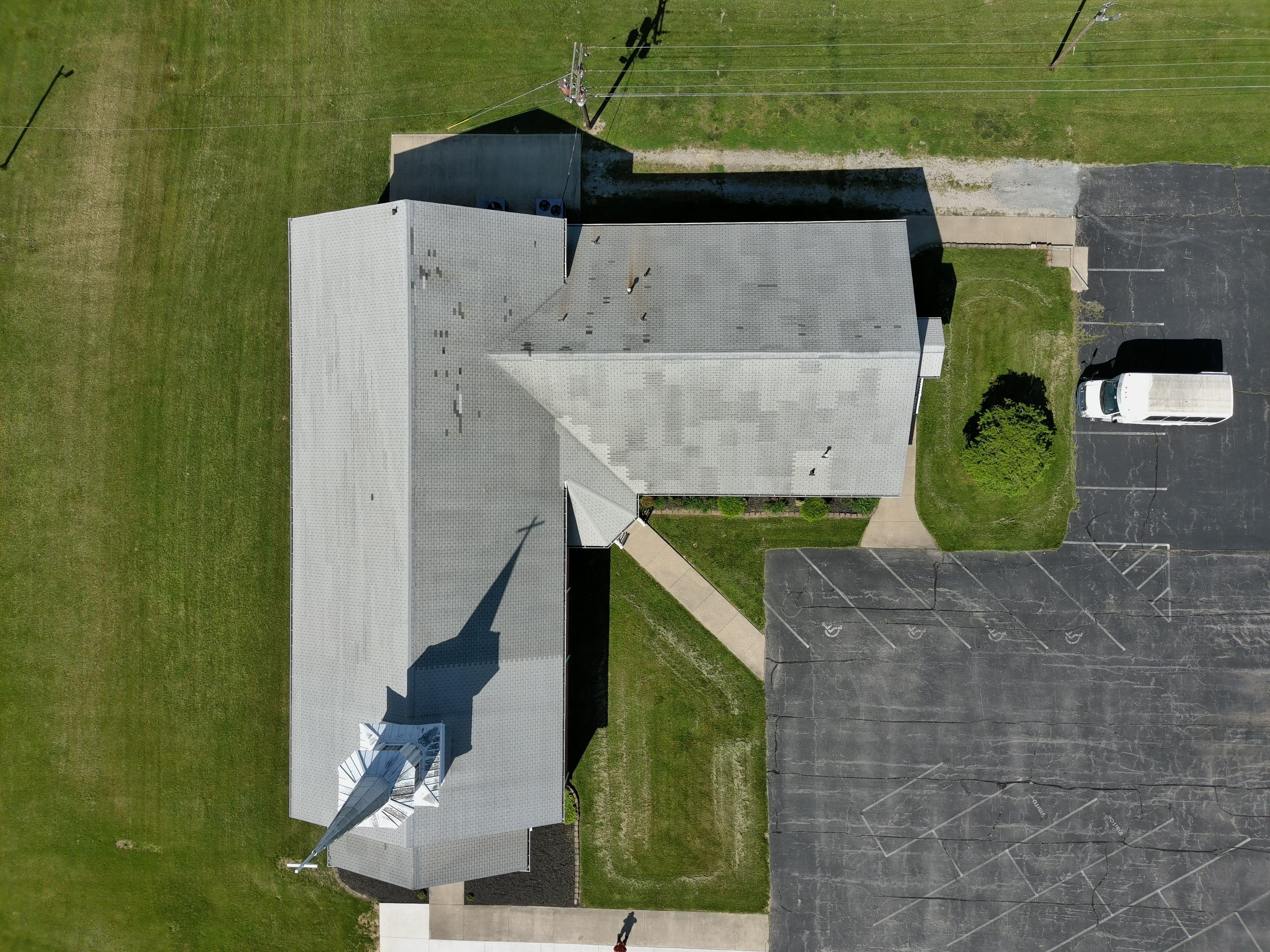 Commercial Roofing Installation using Performance Shingles by Mr. Roofer