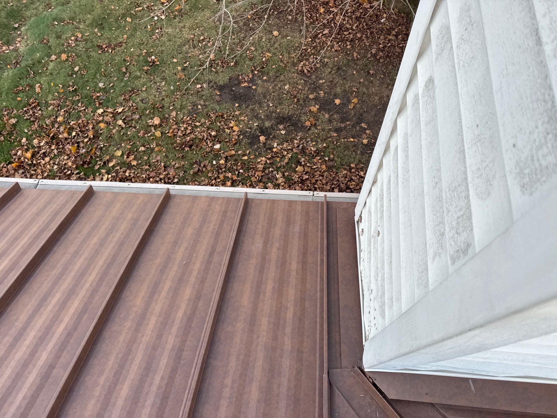 Roof Replacement using MS Standing Seam Roof Western Rust by 180 Contractors